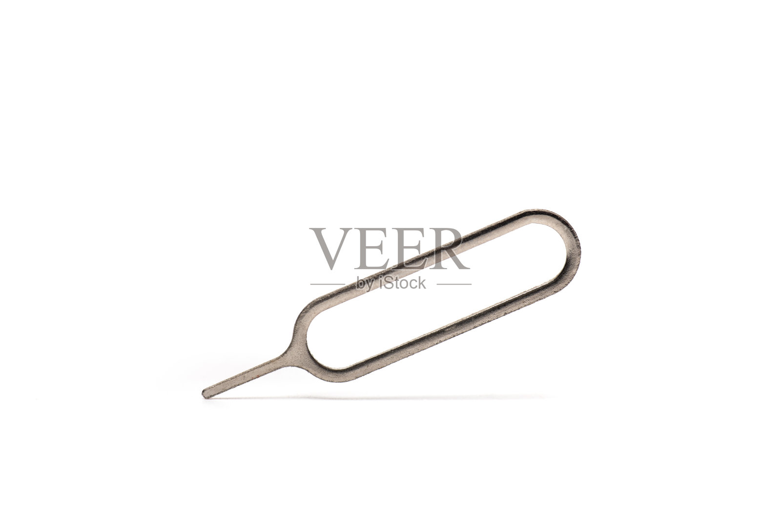 特写金属手机针白色背景照片摄影图片