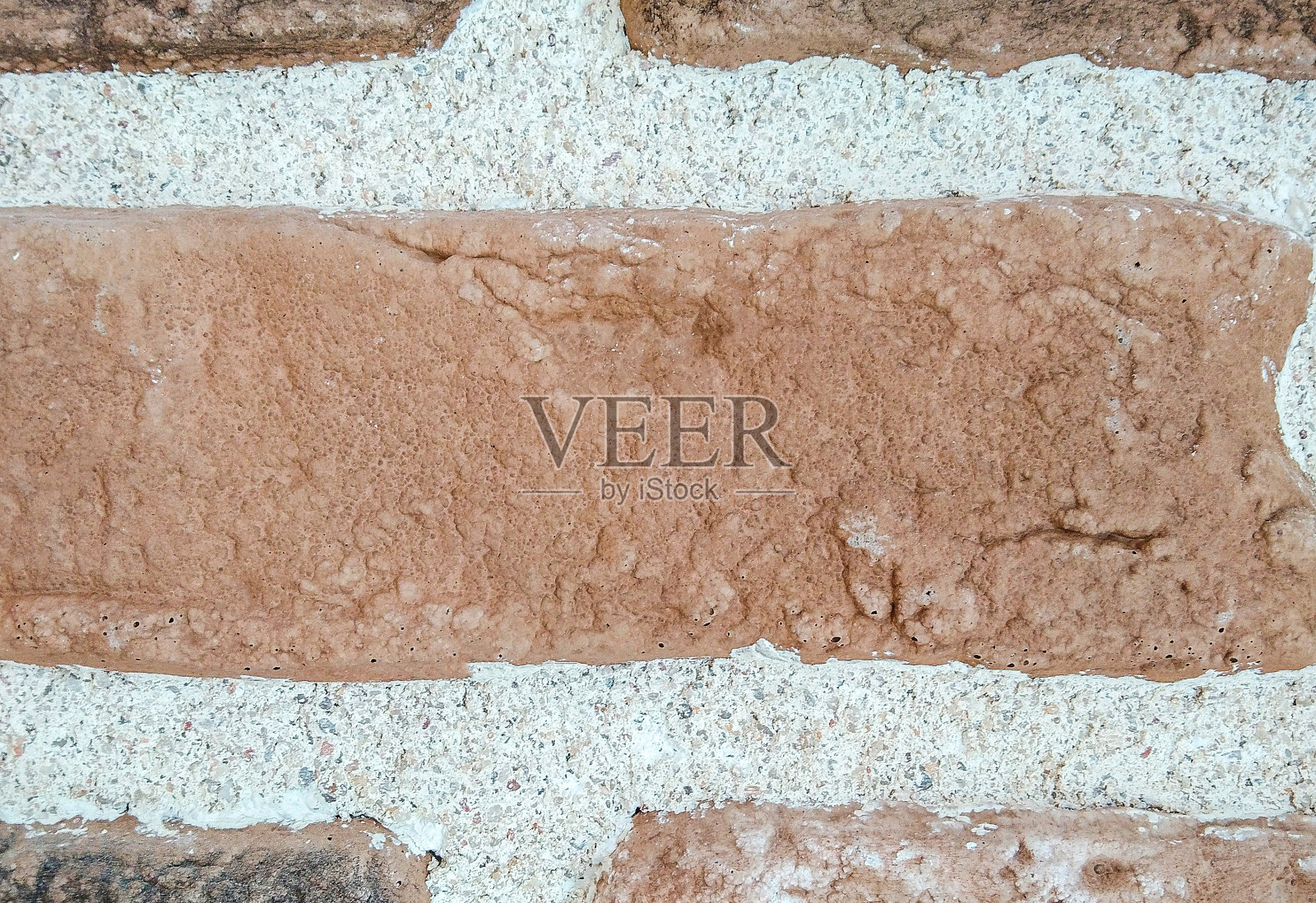 抽象砖墙背景特写。布纹面照片摄影图片