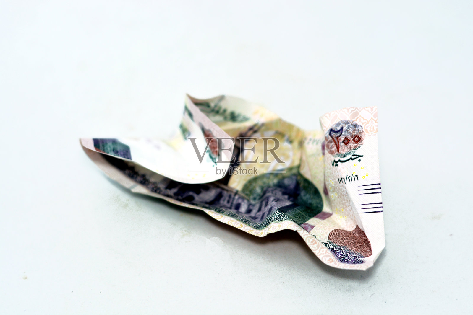 褶皱的埃及200镑纸币，白色背景隔离照片摄影图片