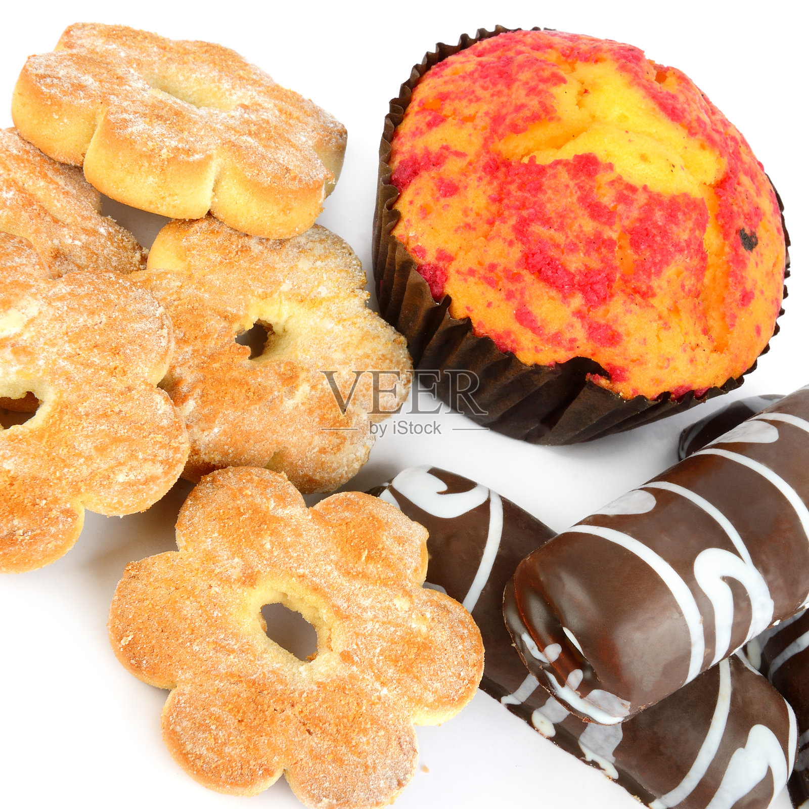 各种各样的饼干和松饼孤立在白色照片摄影图片