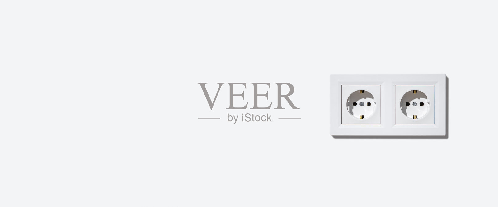 在白色的墙上，白色的框架上有两个插座。横幅。照片摄影图片