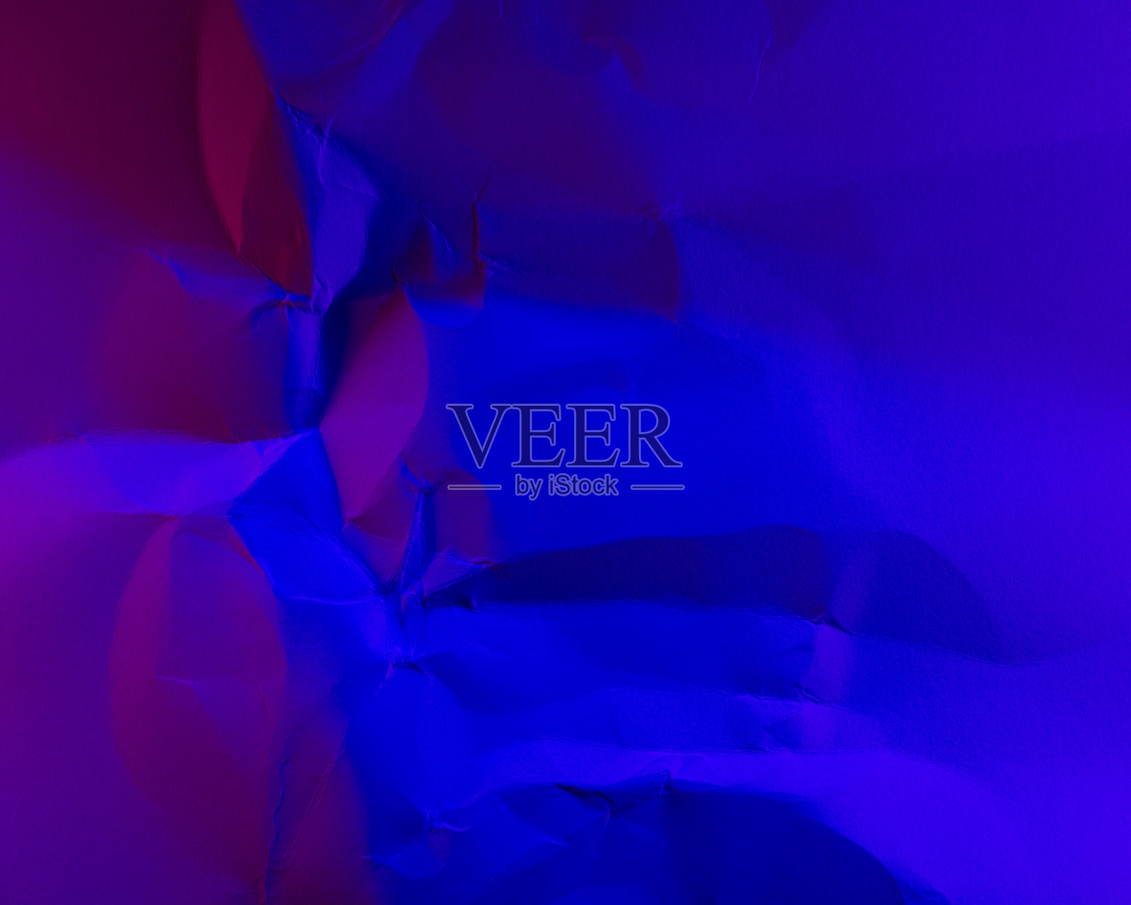 鲜艳的彩色纸背景。照片摄影图片