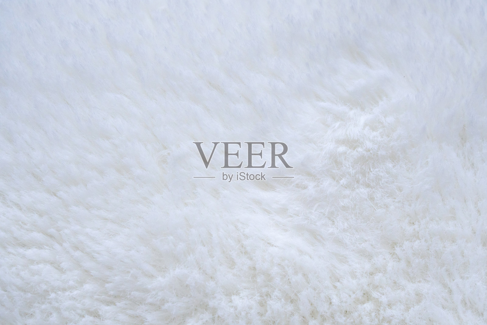 白色绒毛毛皮织物，羊毛纹理背景照片摄影图片