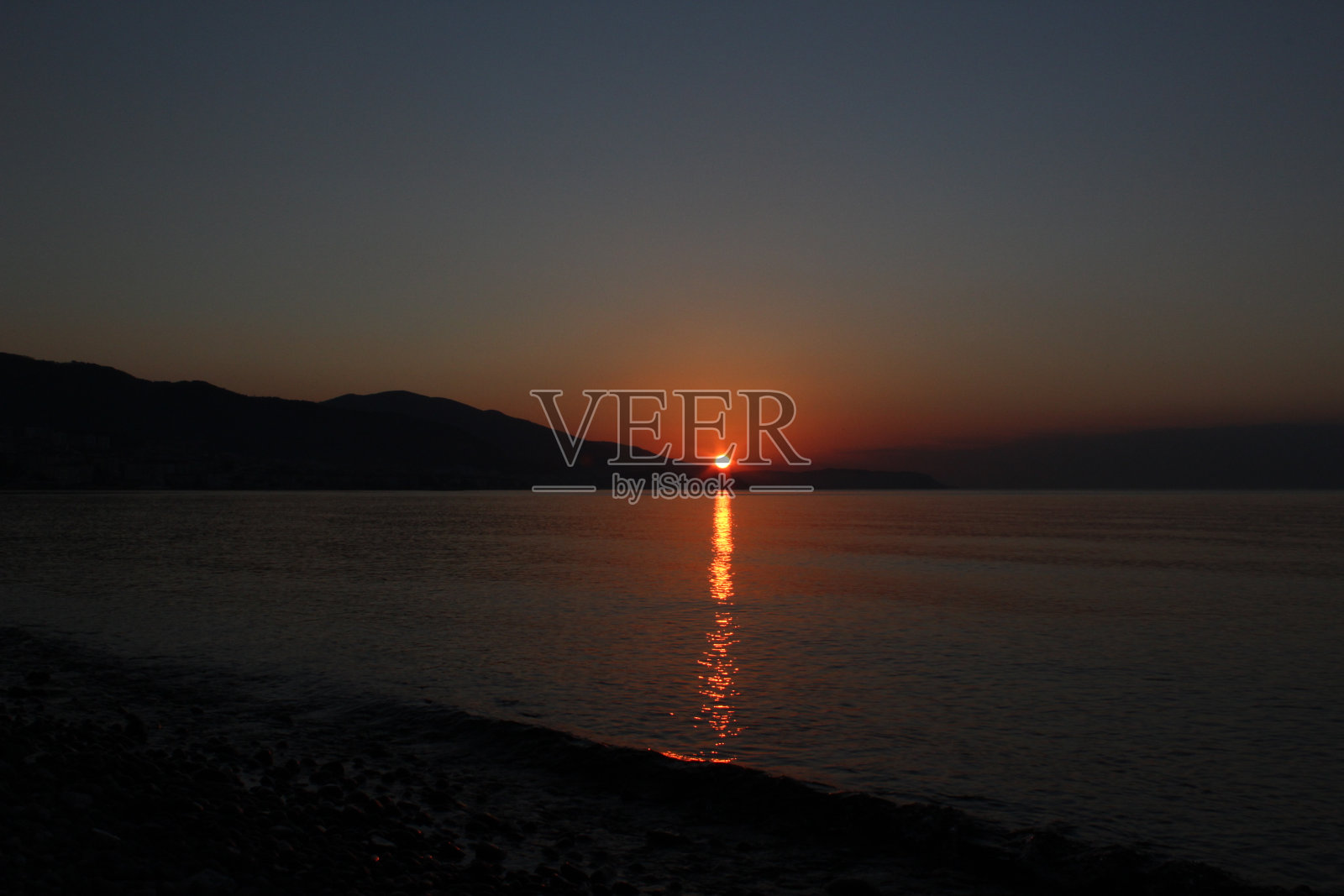 日落和海洋照片摄影图片