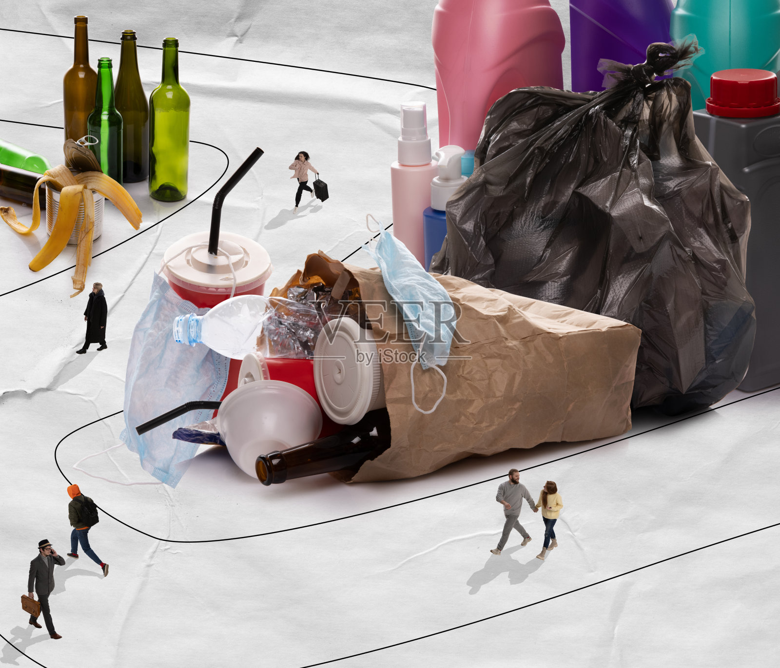 Garbage-monster。城市里的小男人和小女人是由垃圾、塑料和家庭垃圾制成的。当代艺术拼贴，现代创意设计。59、节约环境，保护生态，保护生态照片摄影图片