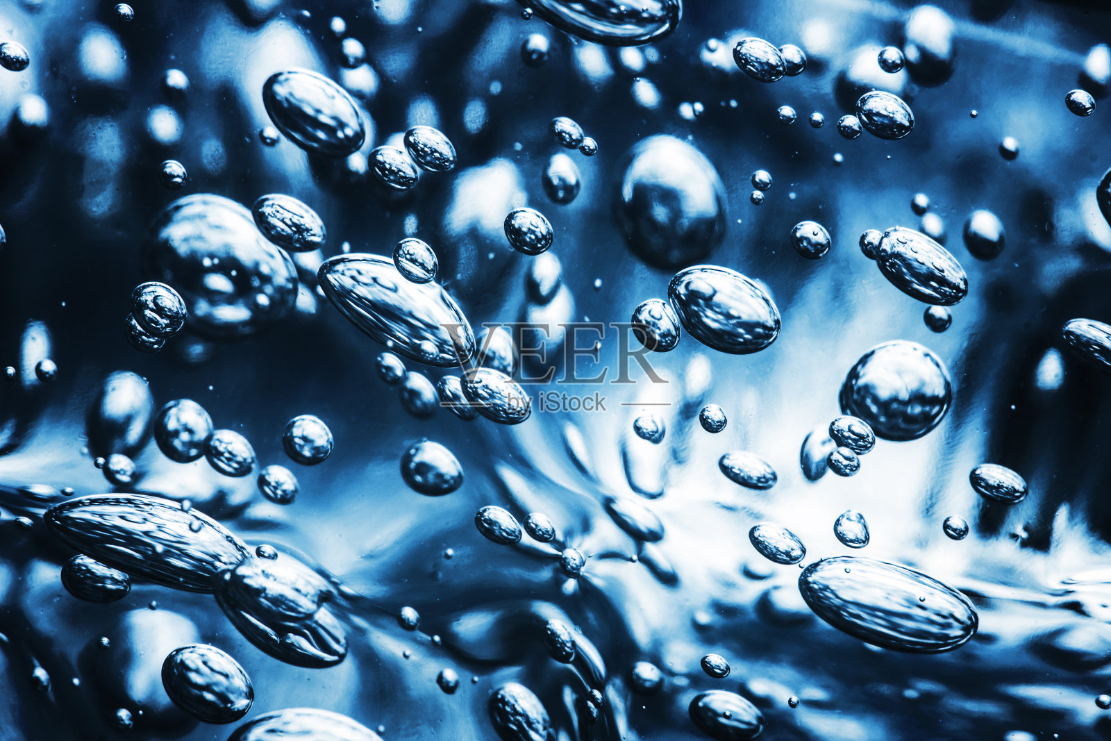 蓝色抽象泡沫水凝胶质地。照片摄影图片