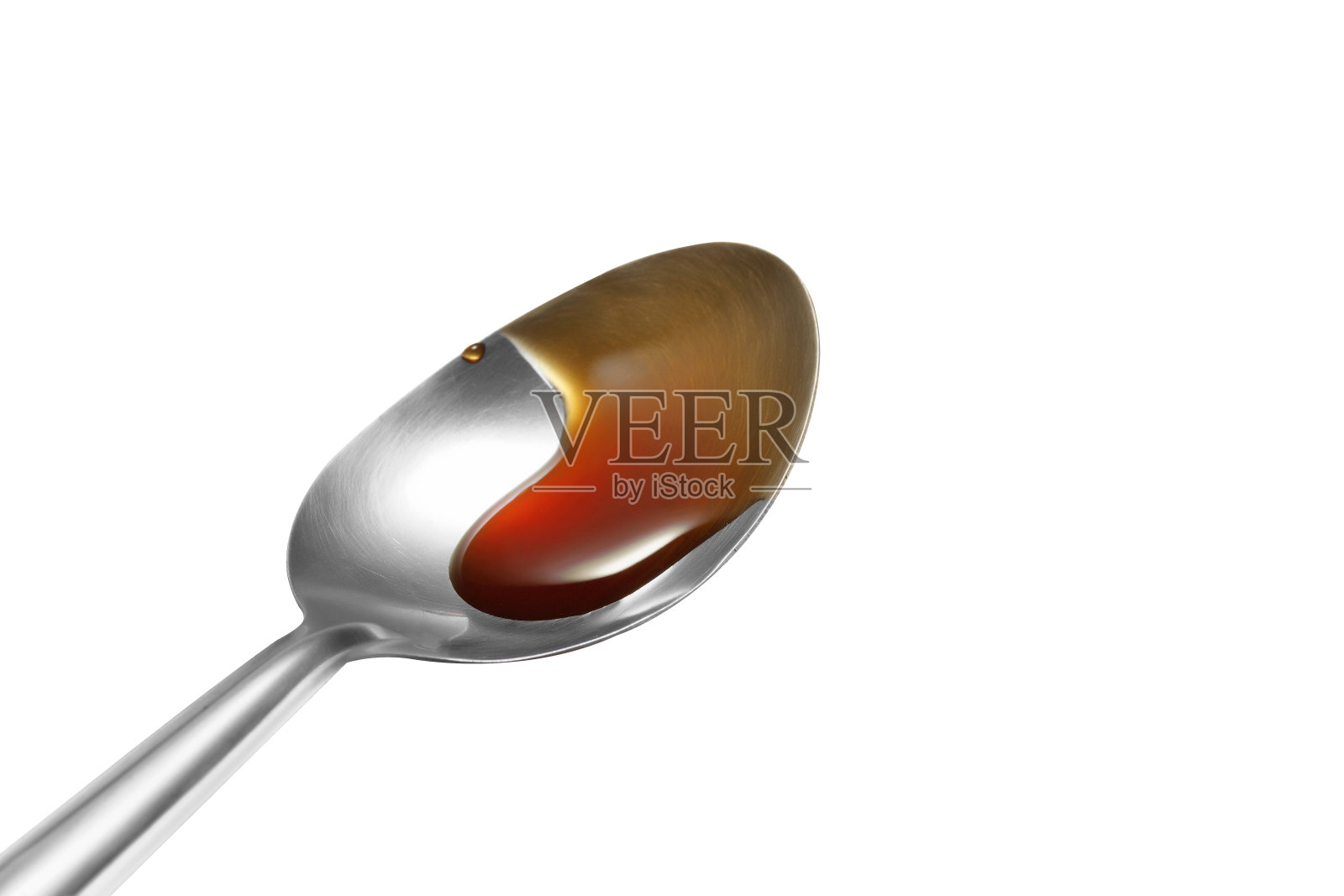 蚝油勺，白色底色照片摄影图片