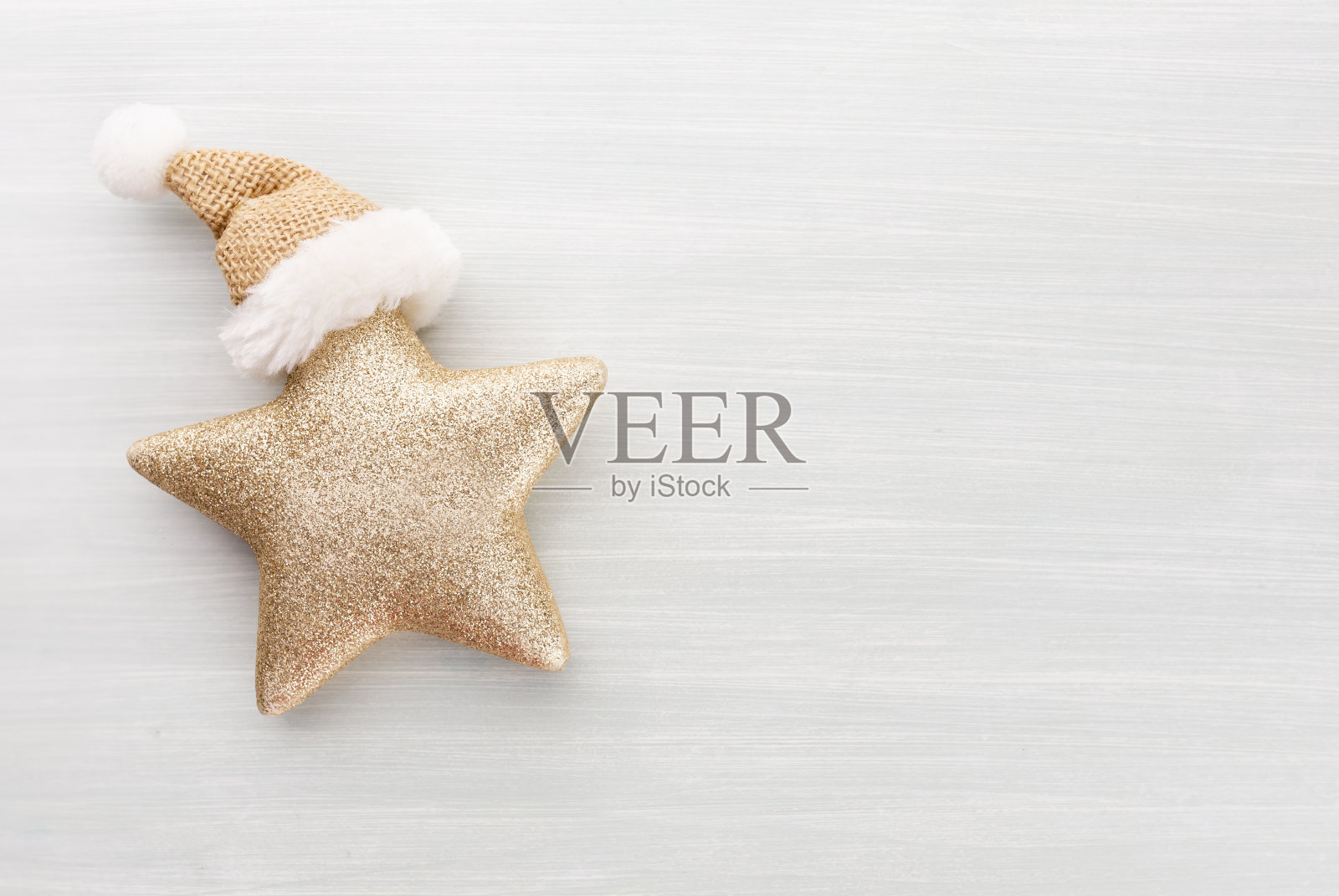 圣诞之星，装饰在纸的背景上。照片摄影图片