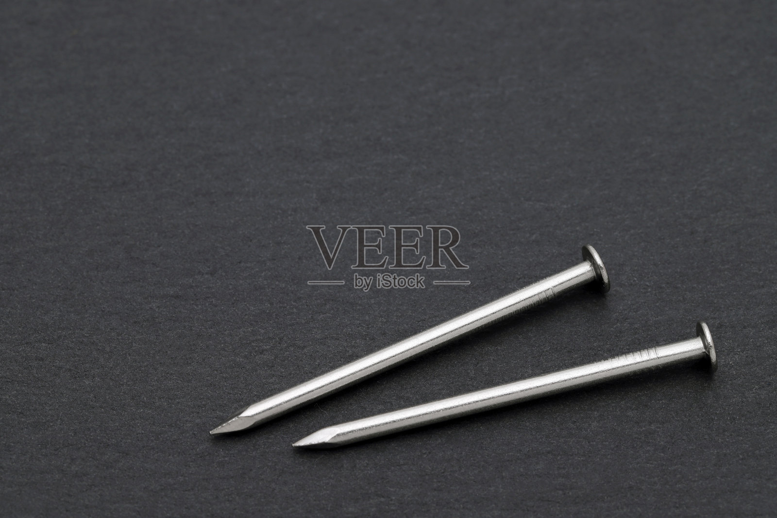 银色金属钉子照片摄影图片