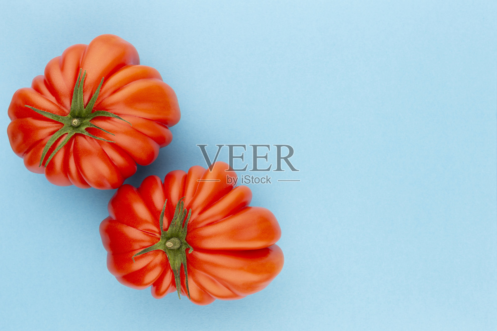 番茄的颜色背景。照片摄影图片