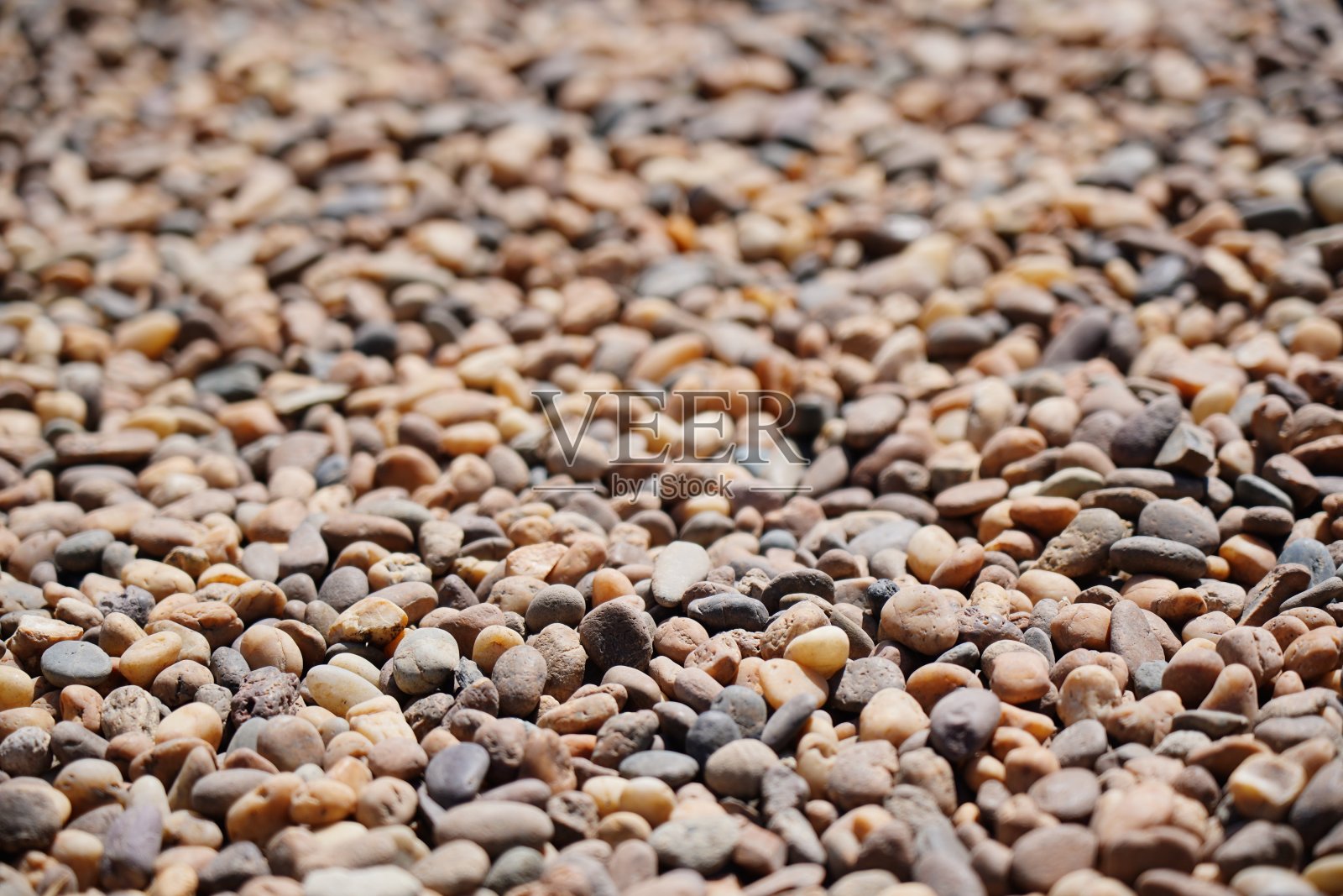 河岩墙纹理在人行道上照片摄影图片