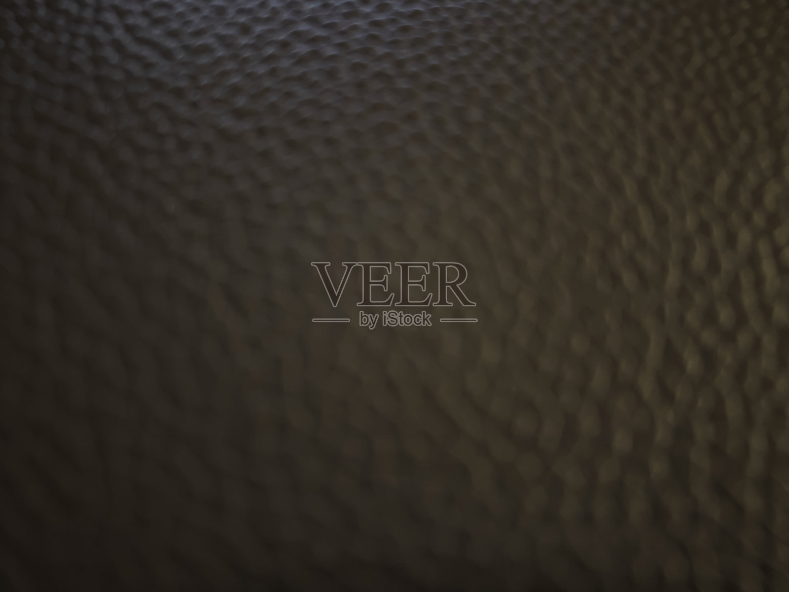 颜色模糊，细纹，深棕色皮革。照片摄影图片