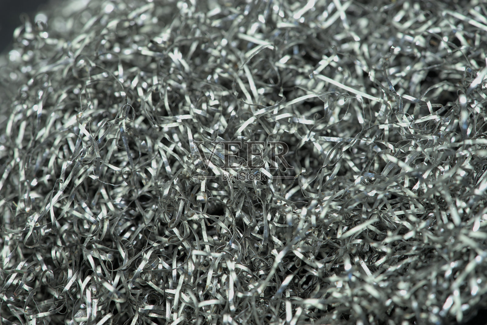 钢中缠绕的金属纤维的背景照片摄影图片