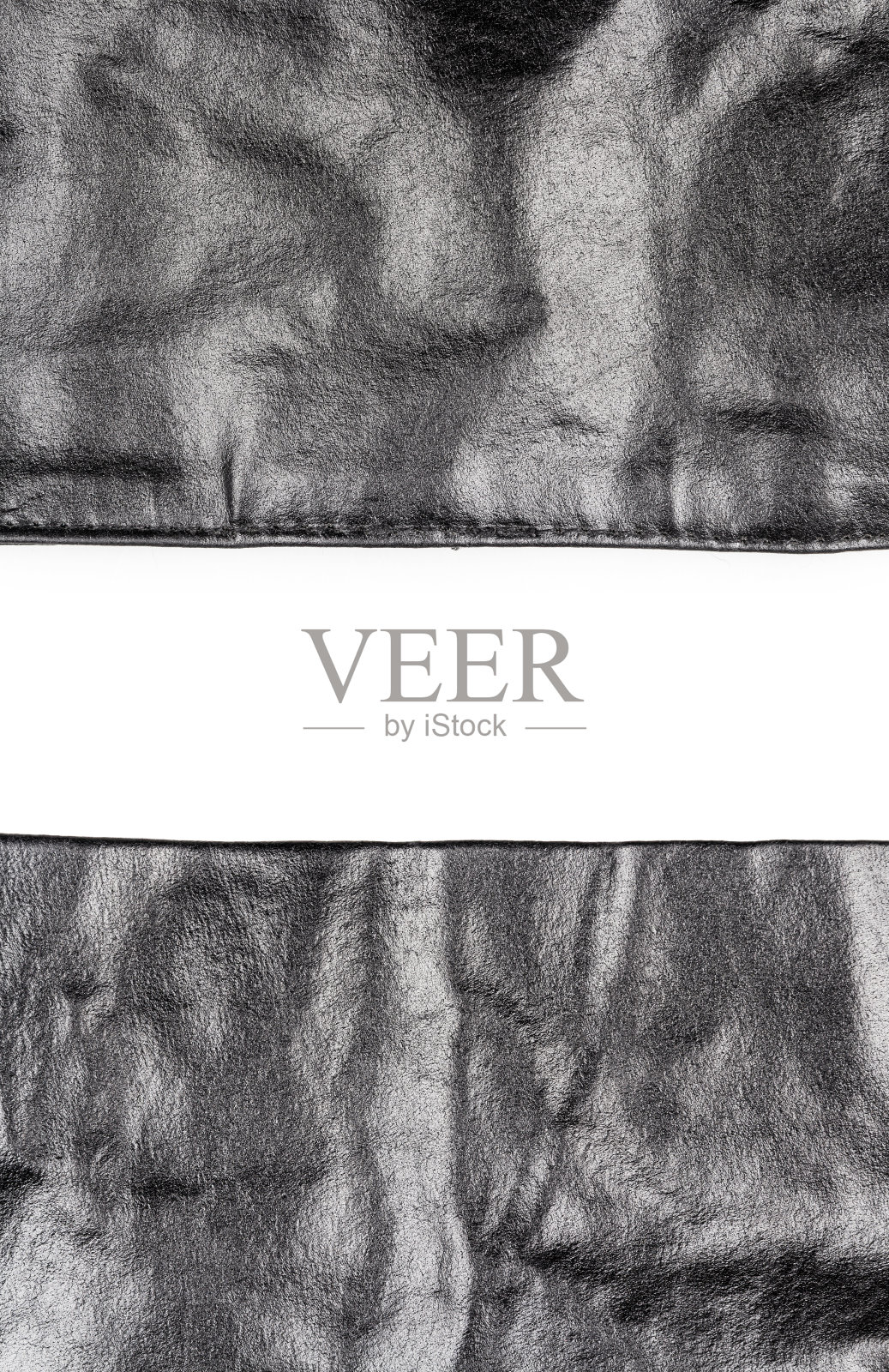 两件黑色皮革与文字空间照片摄影图片