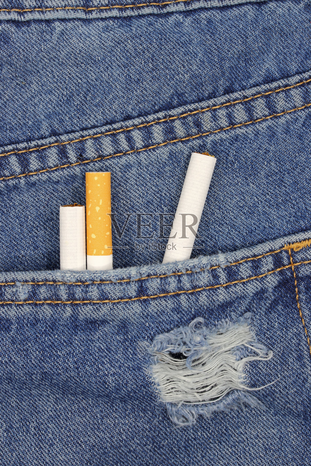 香烟在牛仔裤口袋背景照片摄影图片