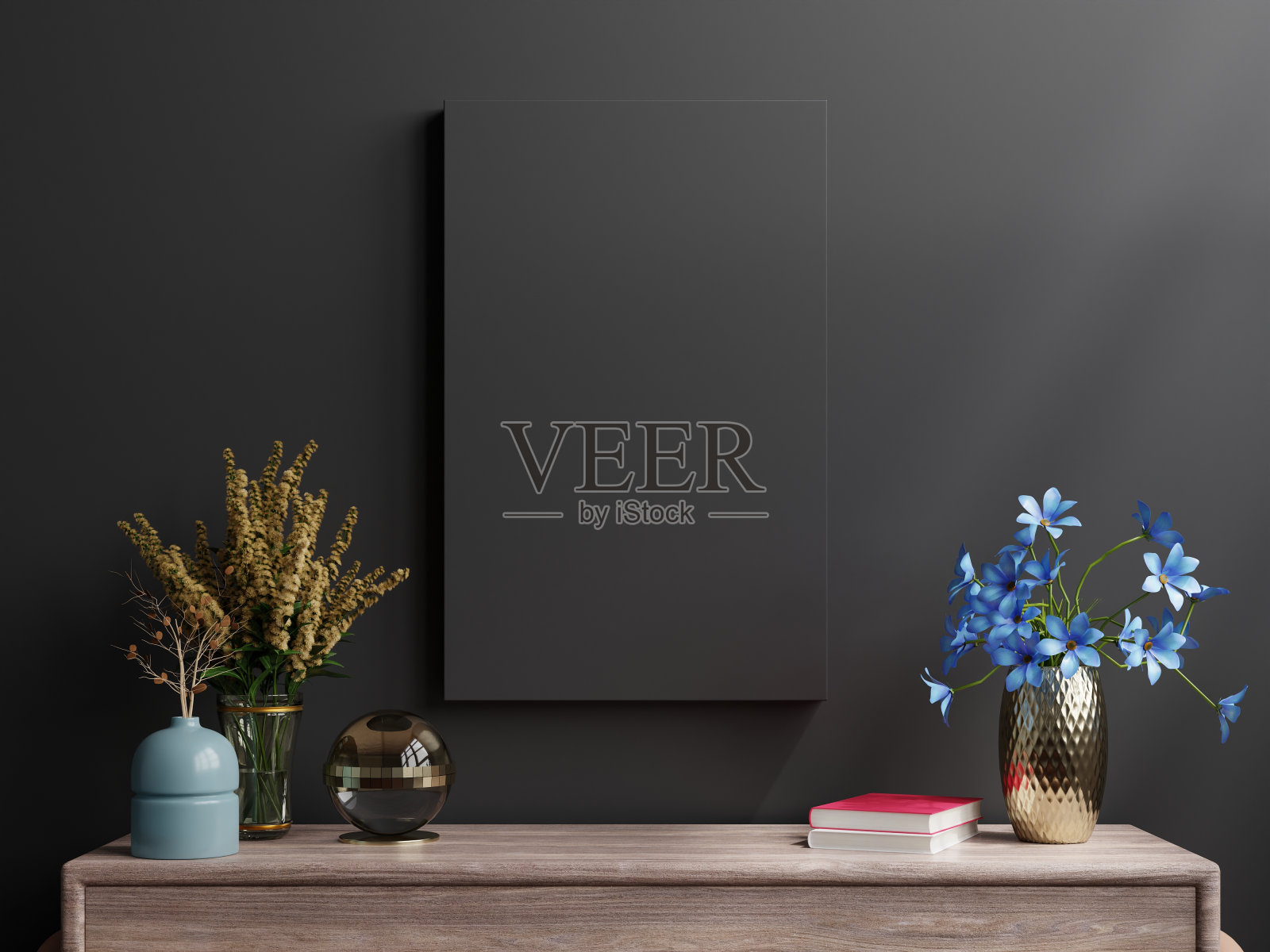 在客厅内部空的黑色墙壁背景上的橱柜上的黑色框架模型。照片摄影图片