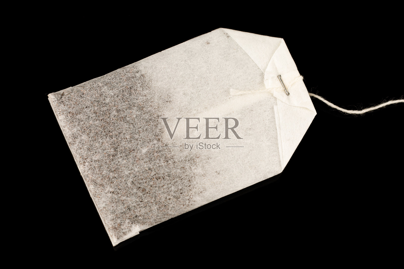 一袋茶是新的黑色背景照片摄影图片