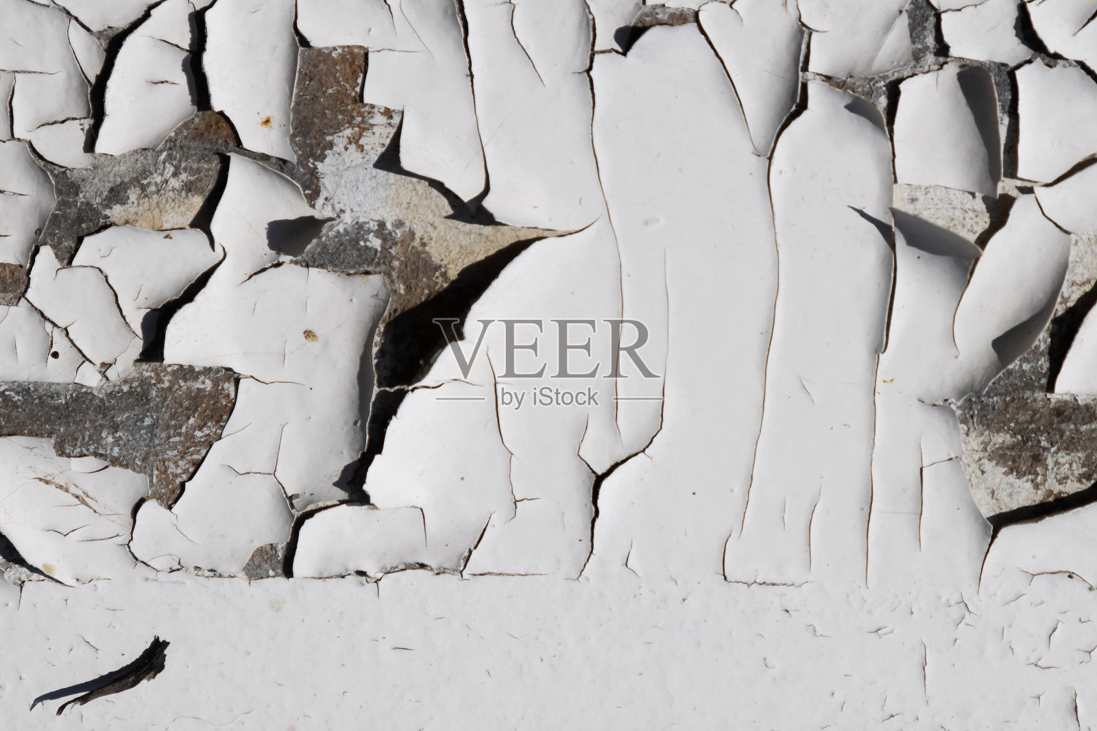 白色裂纹纹理。表面破损、老化、风化。照片摄影图片