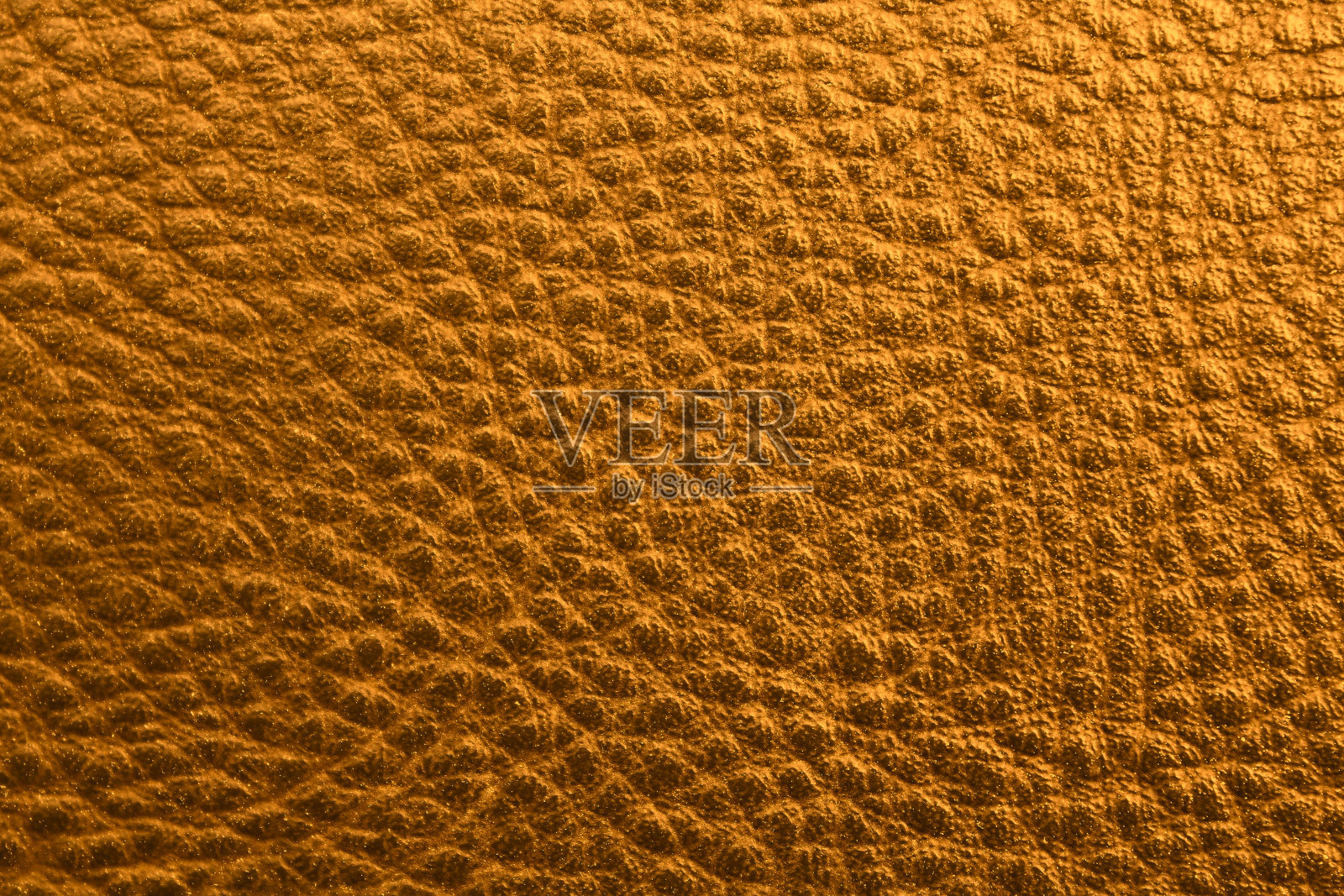 亮黄色人造革。特写镜头。背景。纹理。照片摄影图片