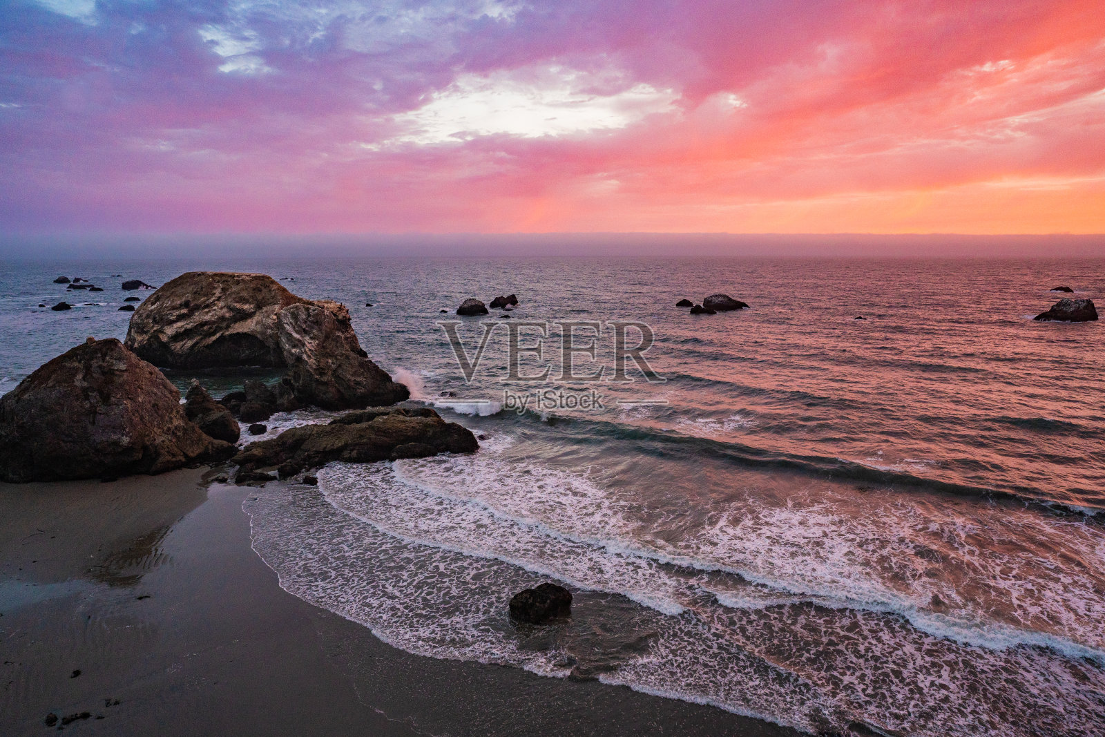 海边詹纳的日落照片摄影图片