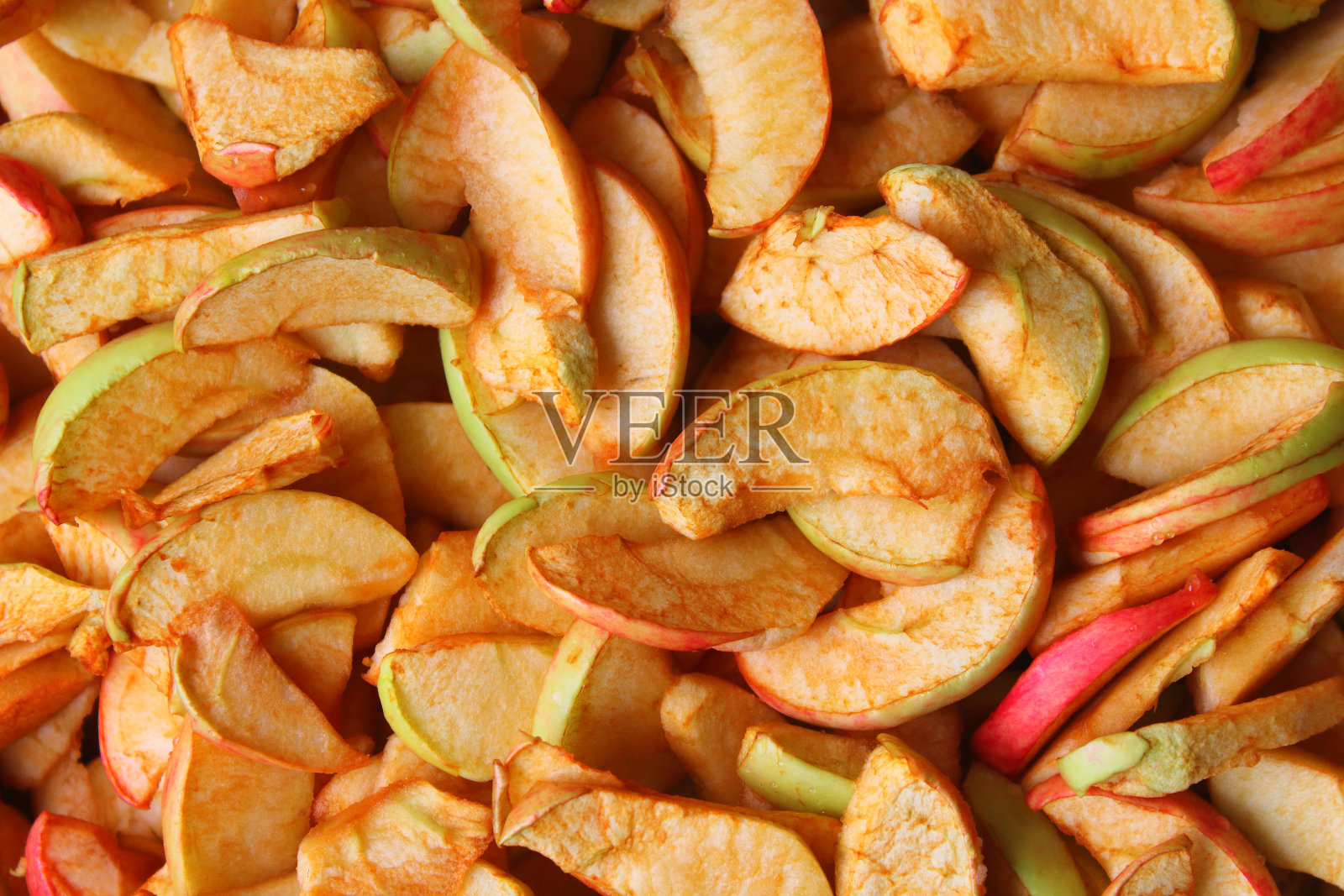 熟苹果片。特写镜头。前视图。背景。纹理。照片摄影图片