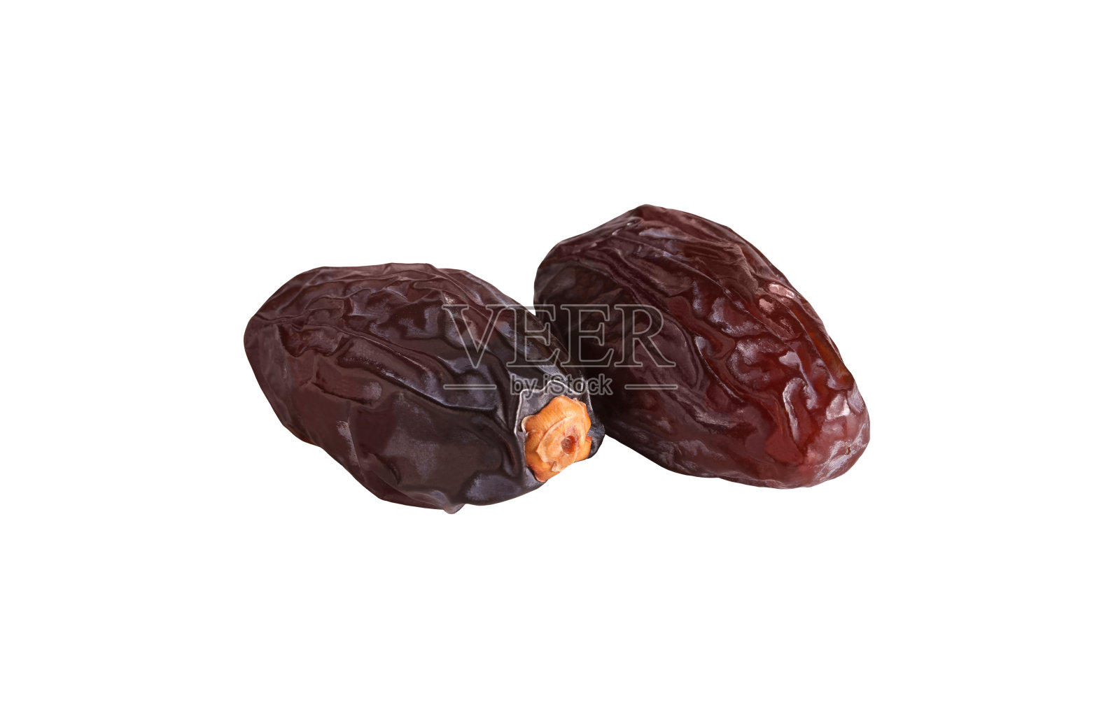 皇家干枣躺在白色的背景上照片摄影图片