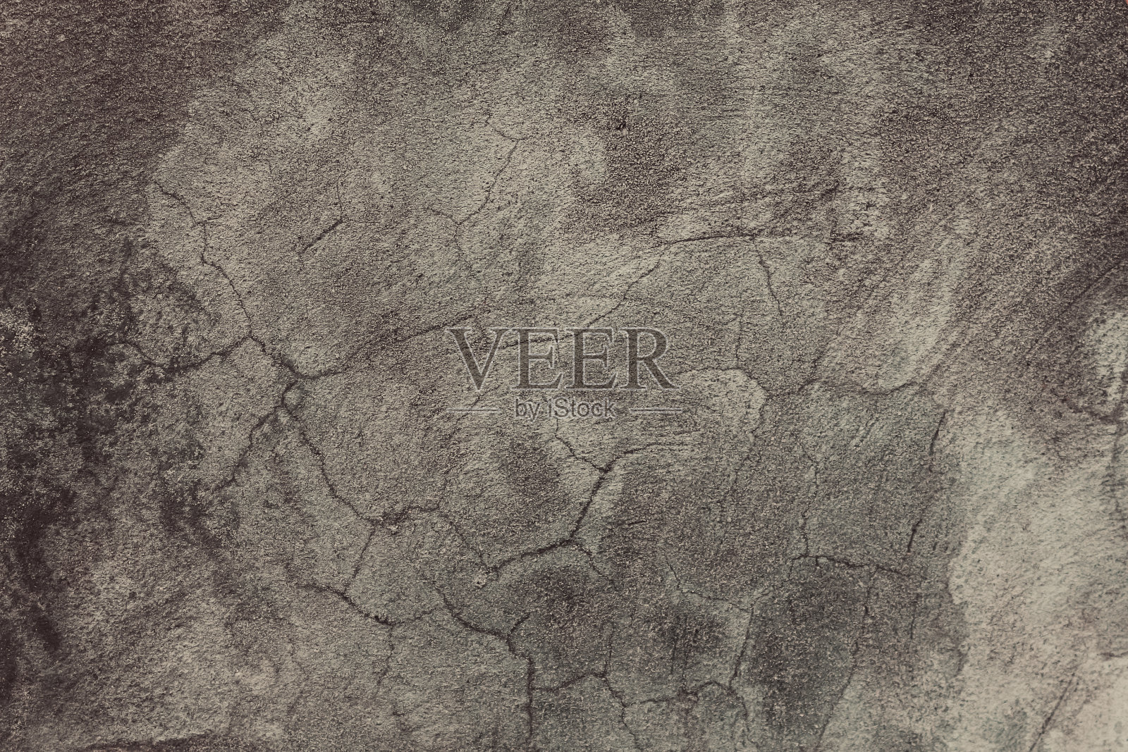 旧的水泥墙背景。混凝土墙面纹理开裂，有损伤和划痕。照片摄影图片