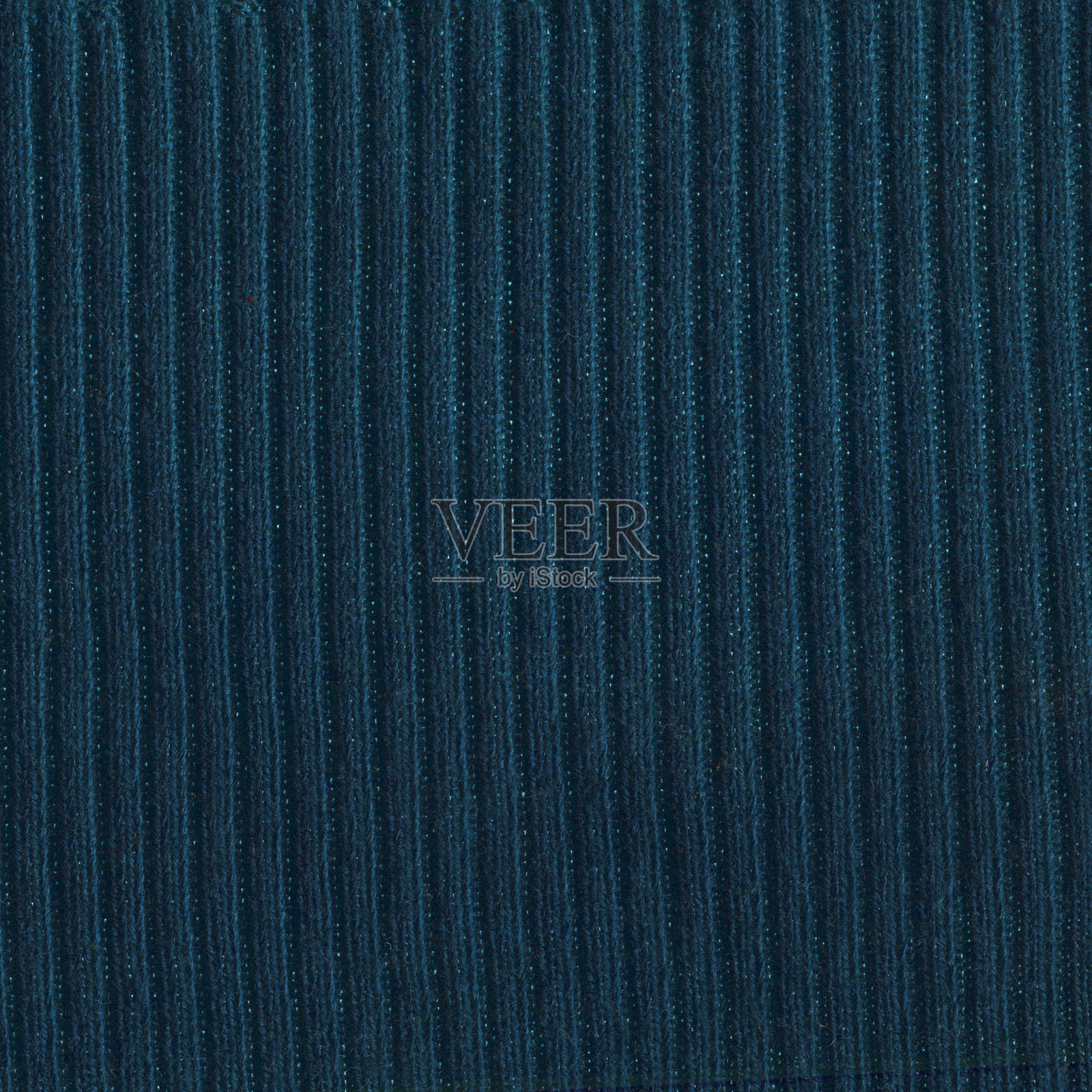 温暖的蓝绿色手工毛衣背景。绿松石针织壁纸或背景。照片摄影图片