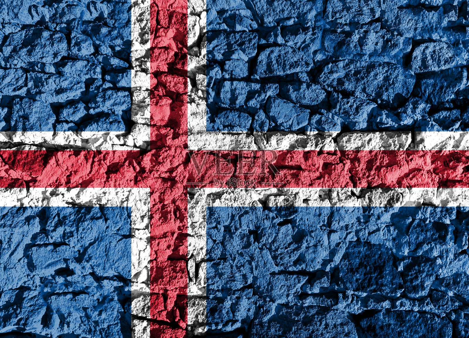 一面石墙上画着冰岛国旗照片摄影图片