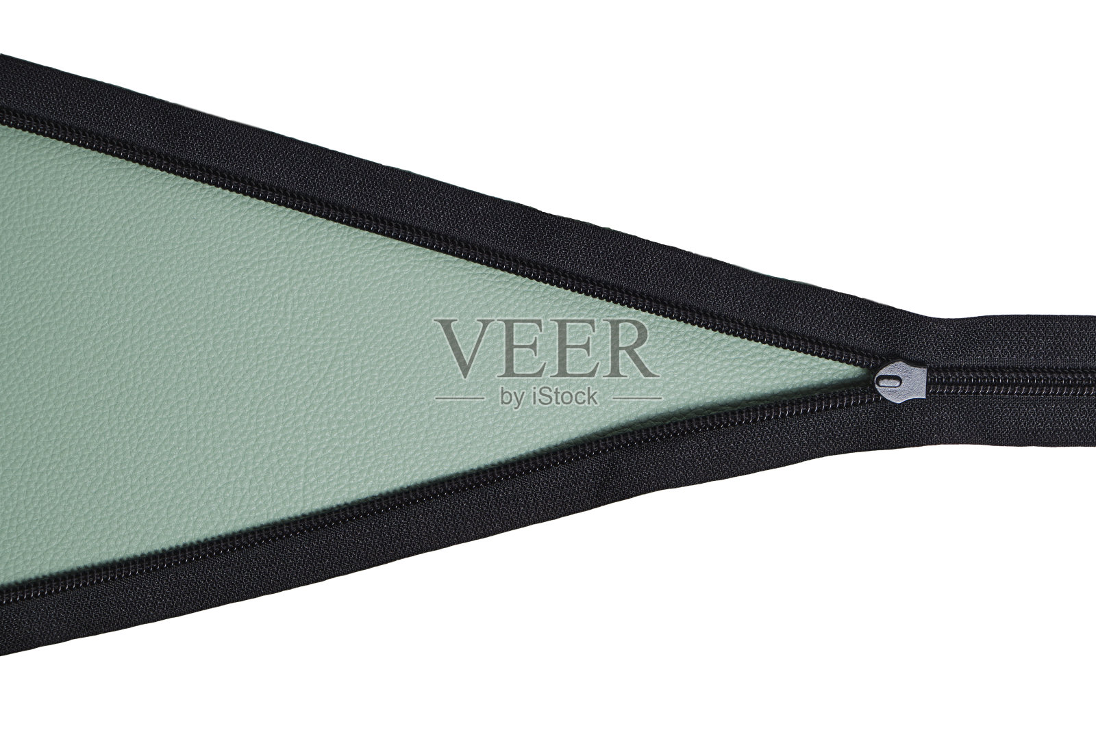 无扣拉链与绿色和白色的背景与copyspace。照片摄影图片