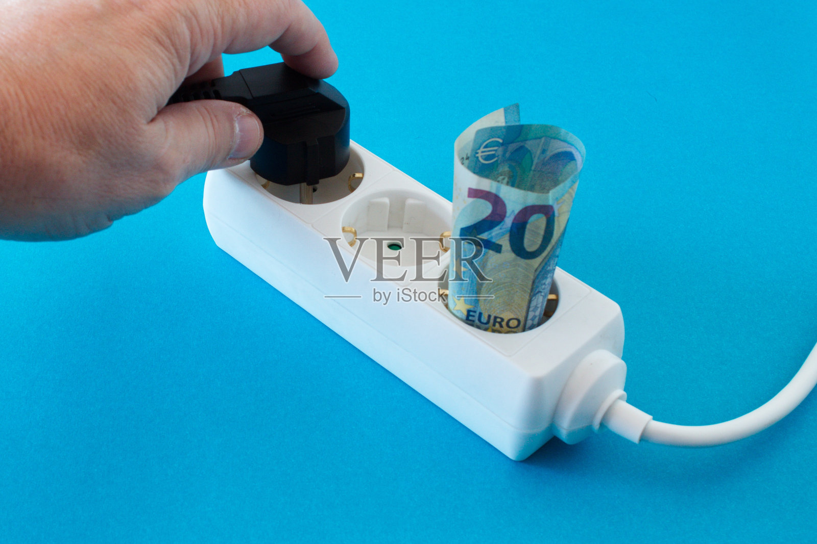 一种以钞票形式标明成本的供电装置照片摄影图片