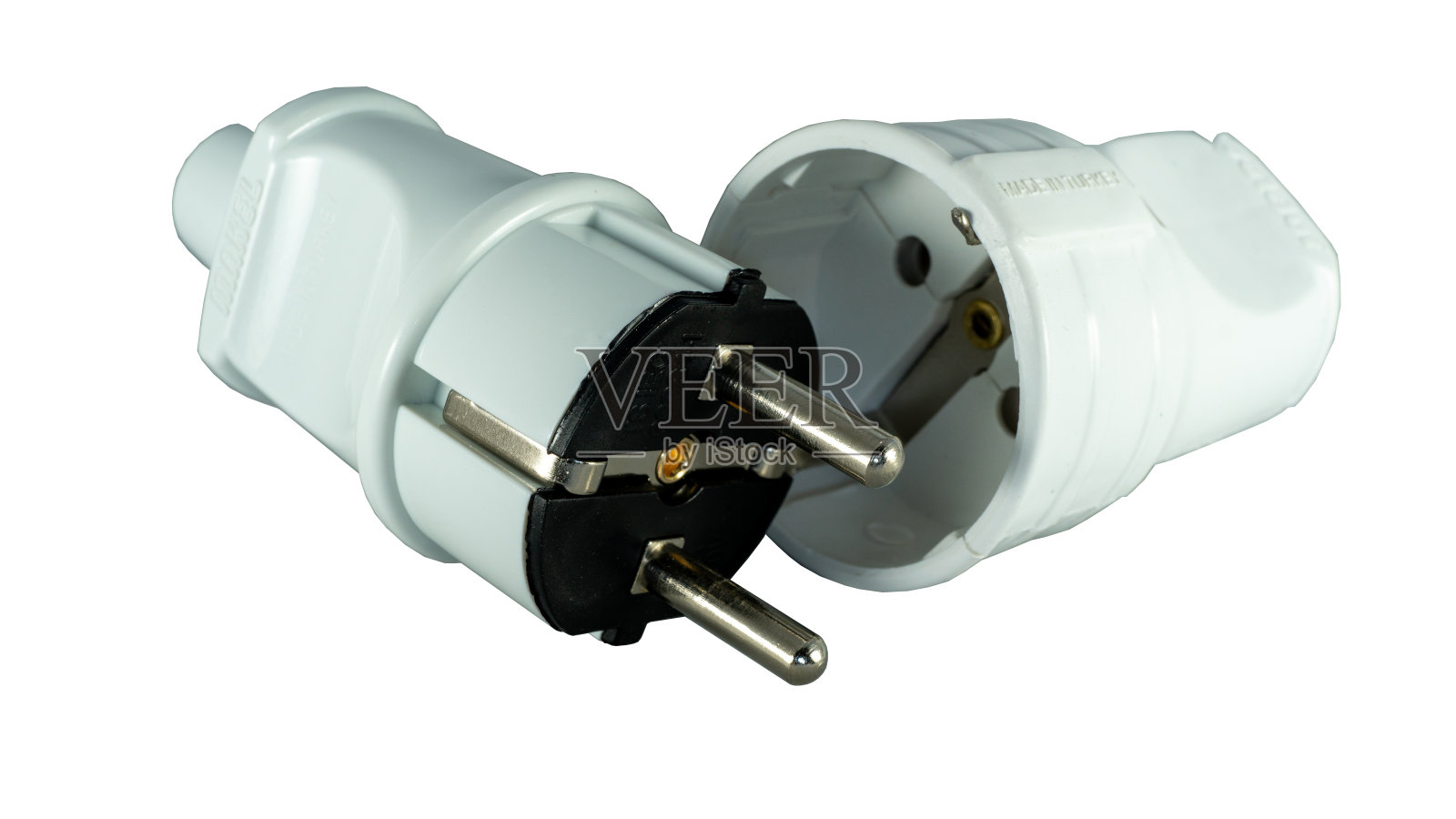 公插头和母插头。无线充电结束。接地插头。照片摄影图片