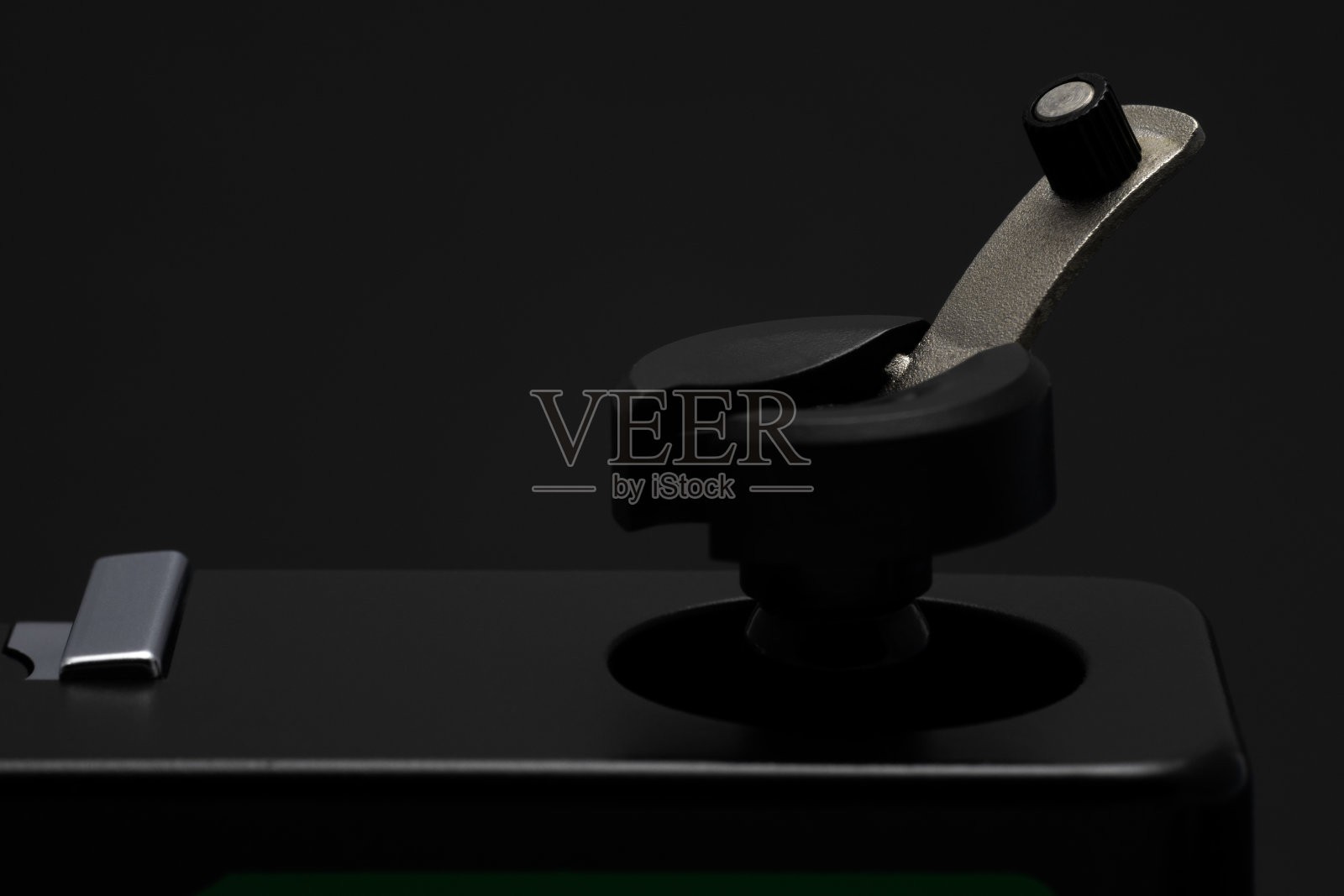 黑色复古胶卷相机的倒带曲柄照片摄影图片