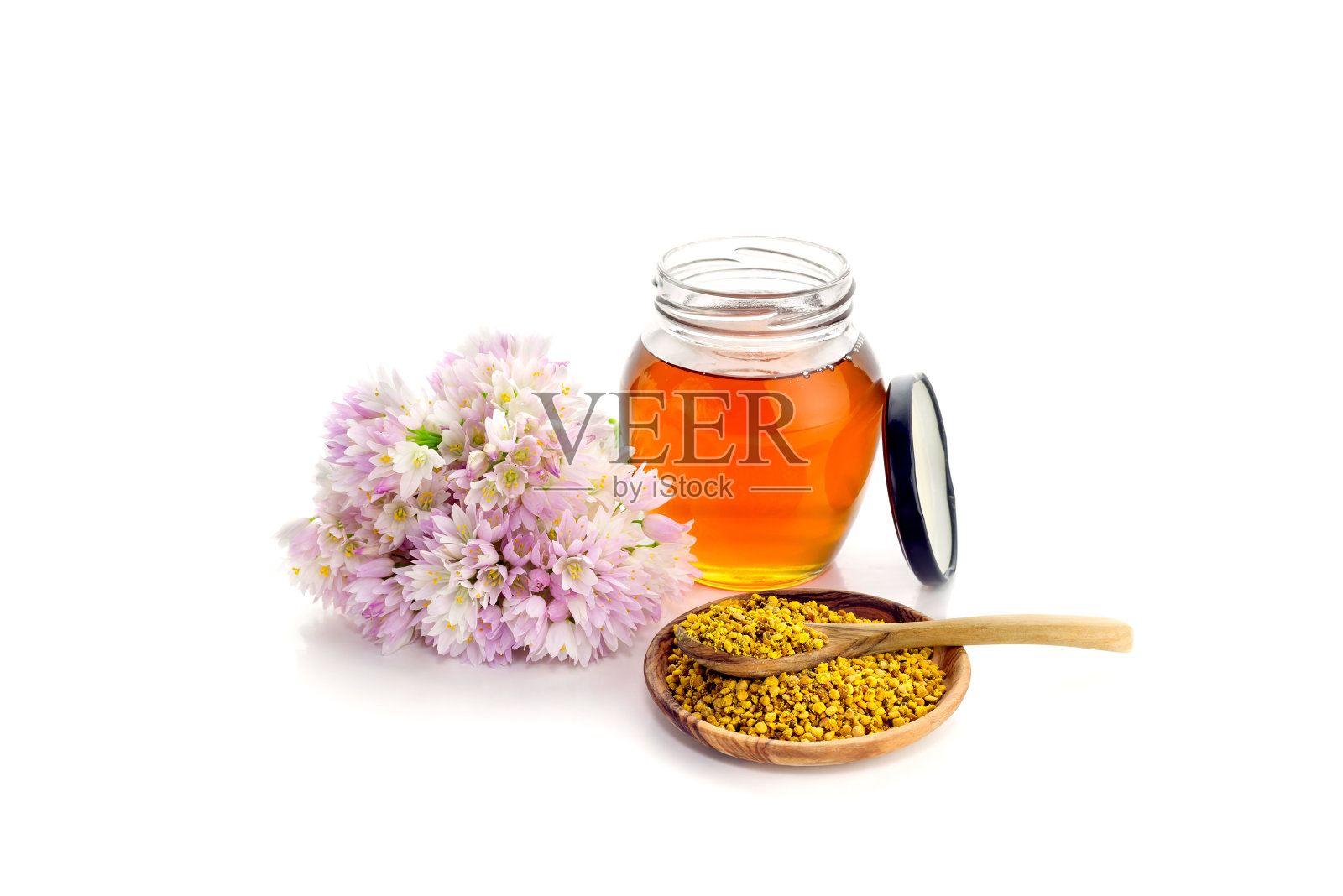 装满蜂蜜和花粉的罐子照片摄影图片