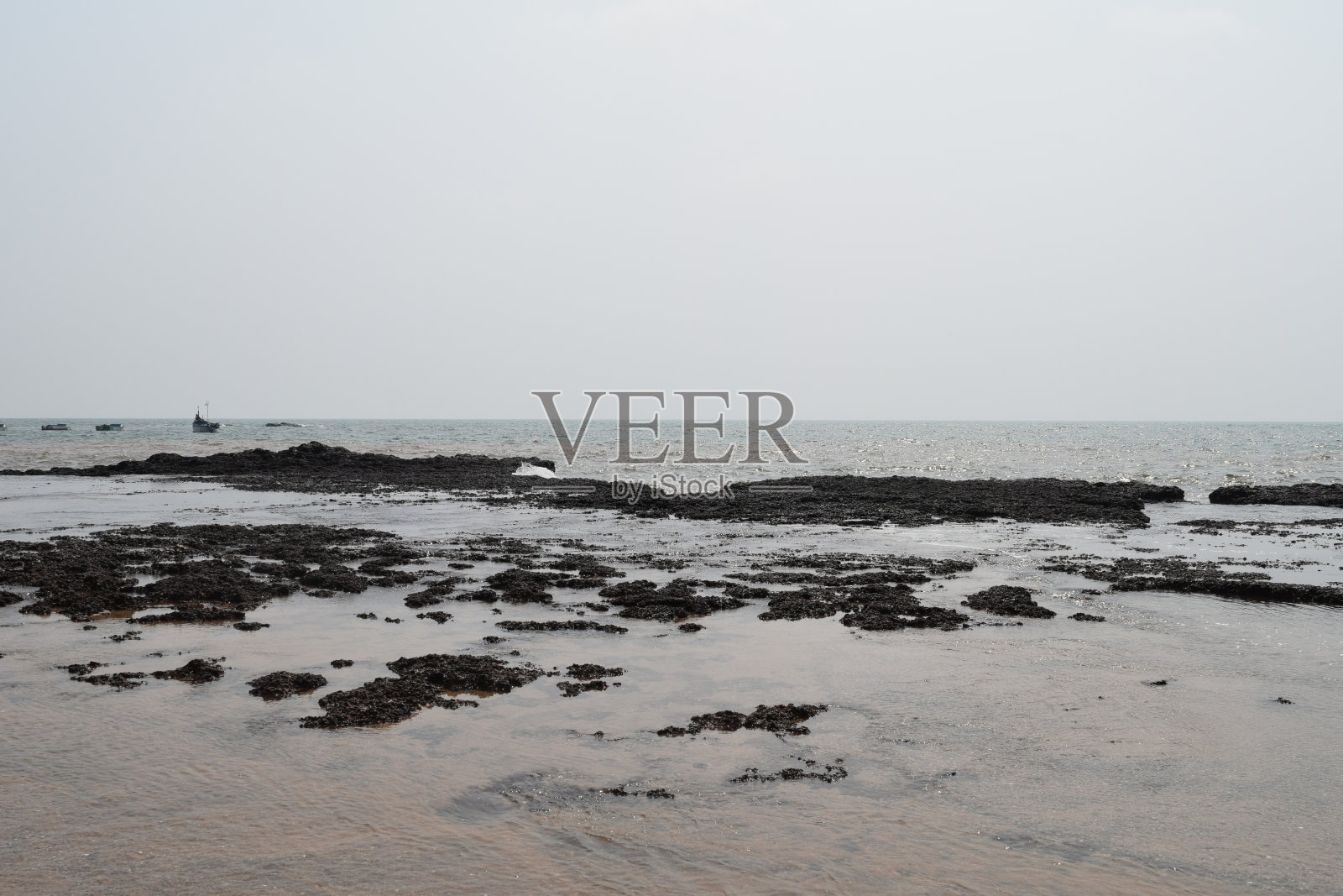 岩石结构，安君那海滩照片摄影图片