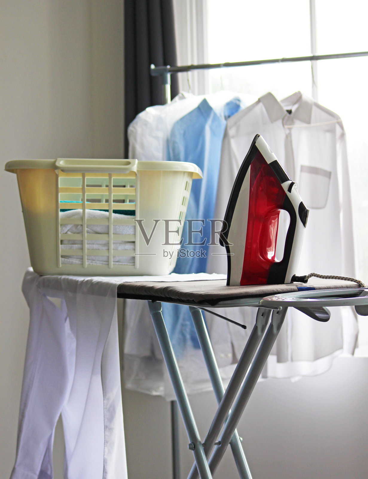 熨衣服业务照片摄影图片