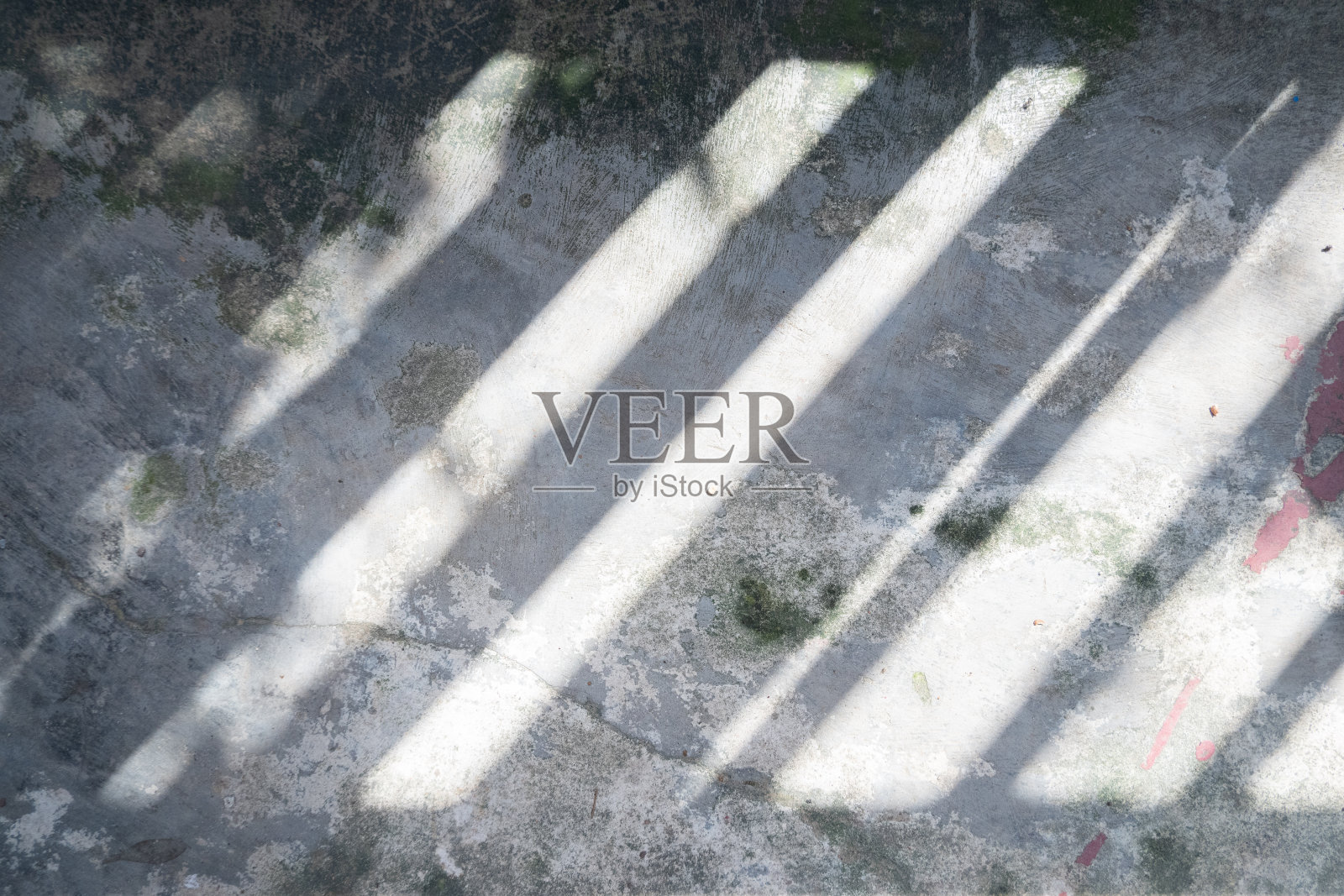 开裂的混凝土地板背景与剪影照片摄影图片