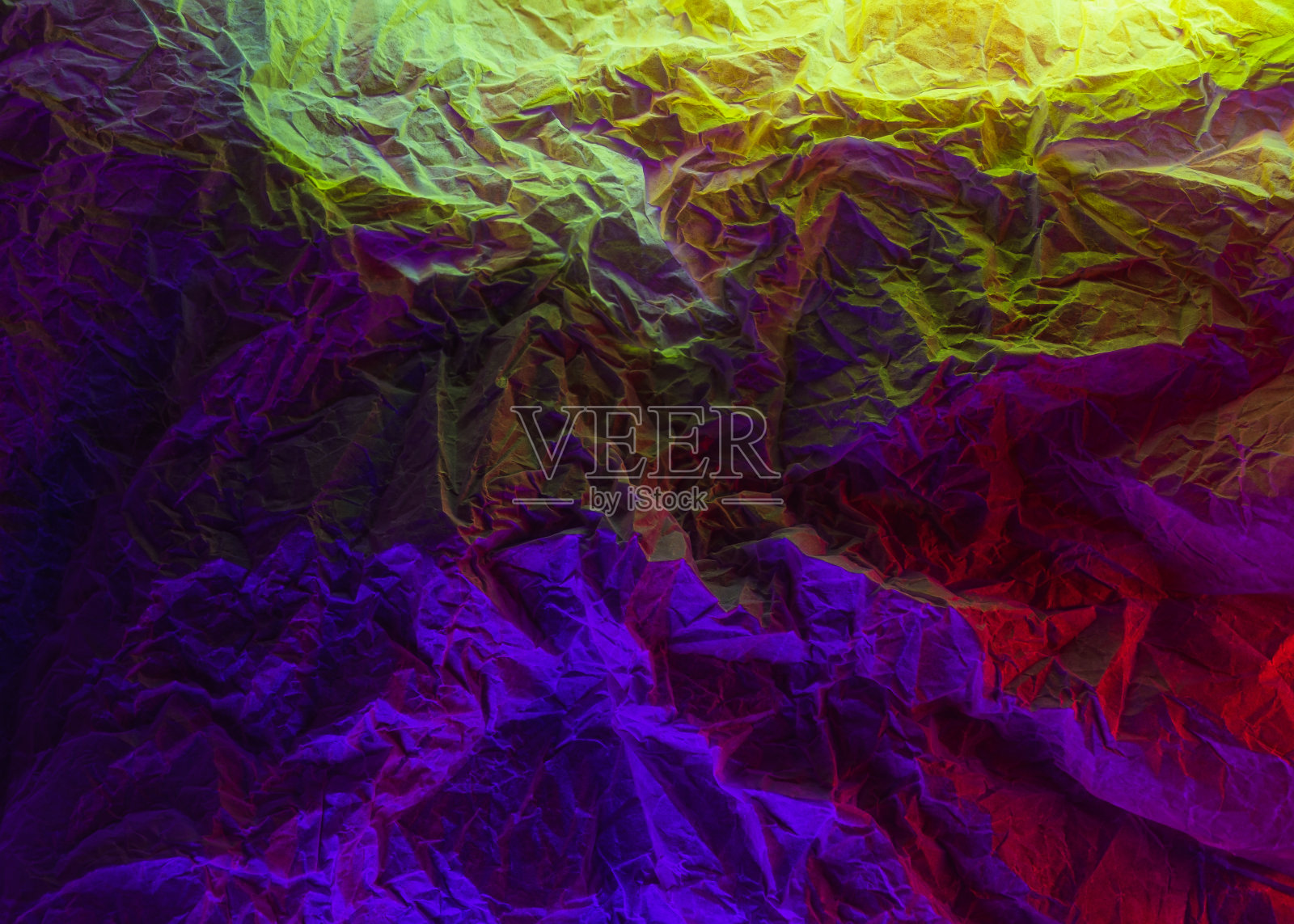 多色纸背景。照片摄影图片