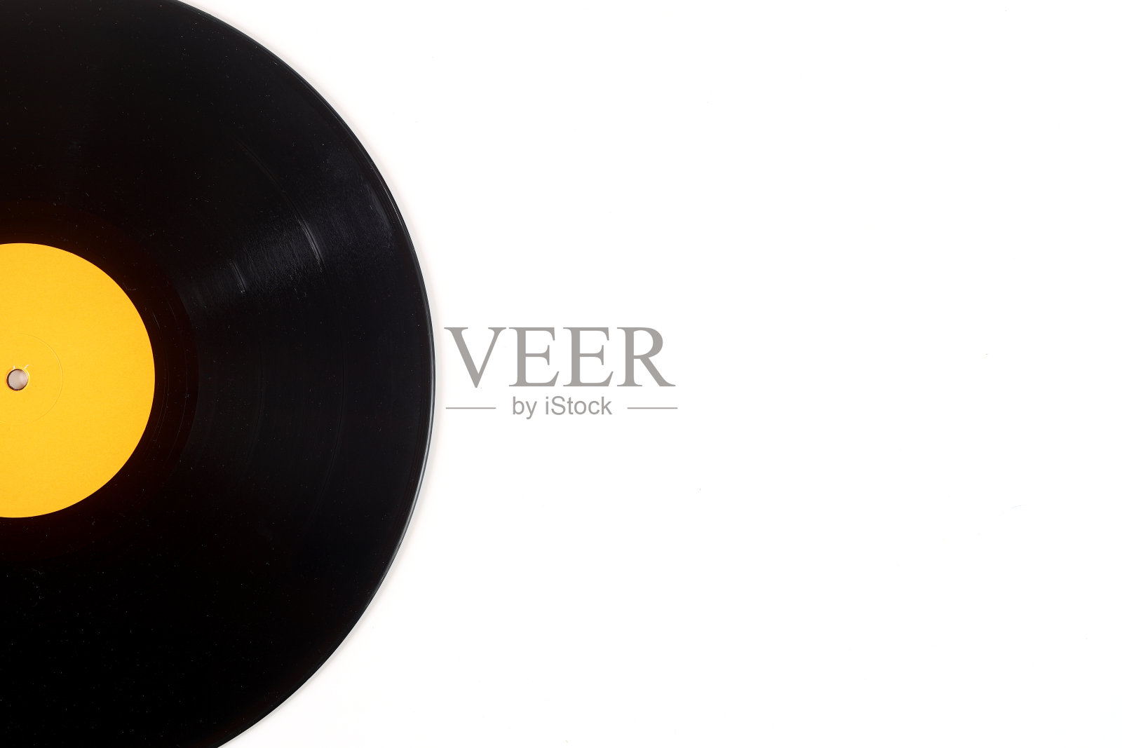 白底黑胶唱片。复古的风格。前视图。副本的空间。照片摄影图片