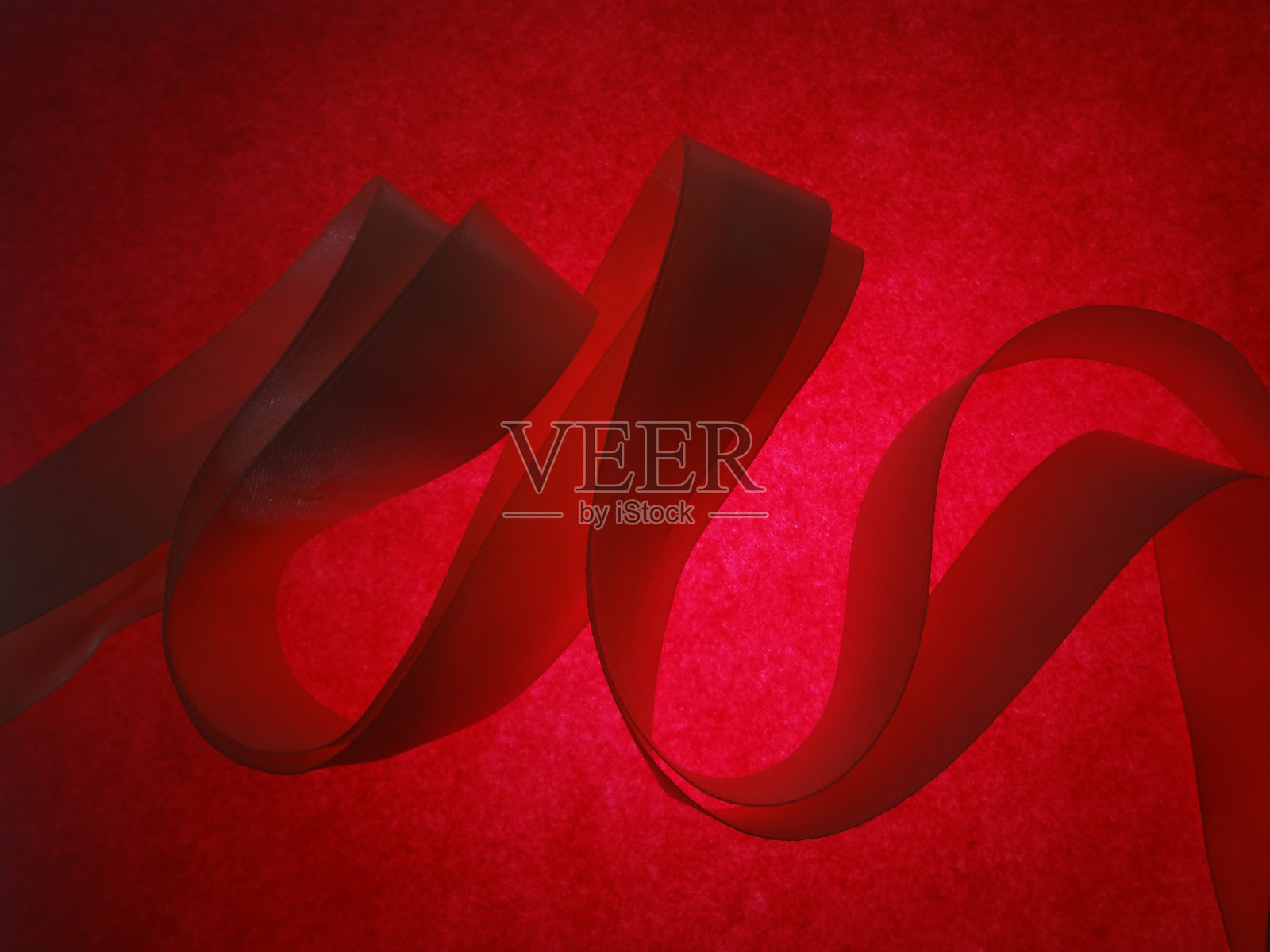 摘要背景红丝带蝴蝶结庆典装饰照片摄影图片