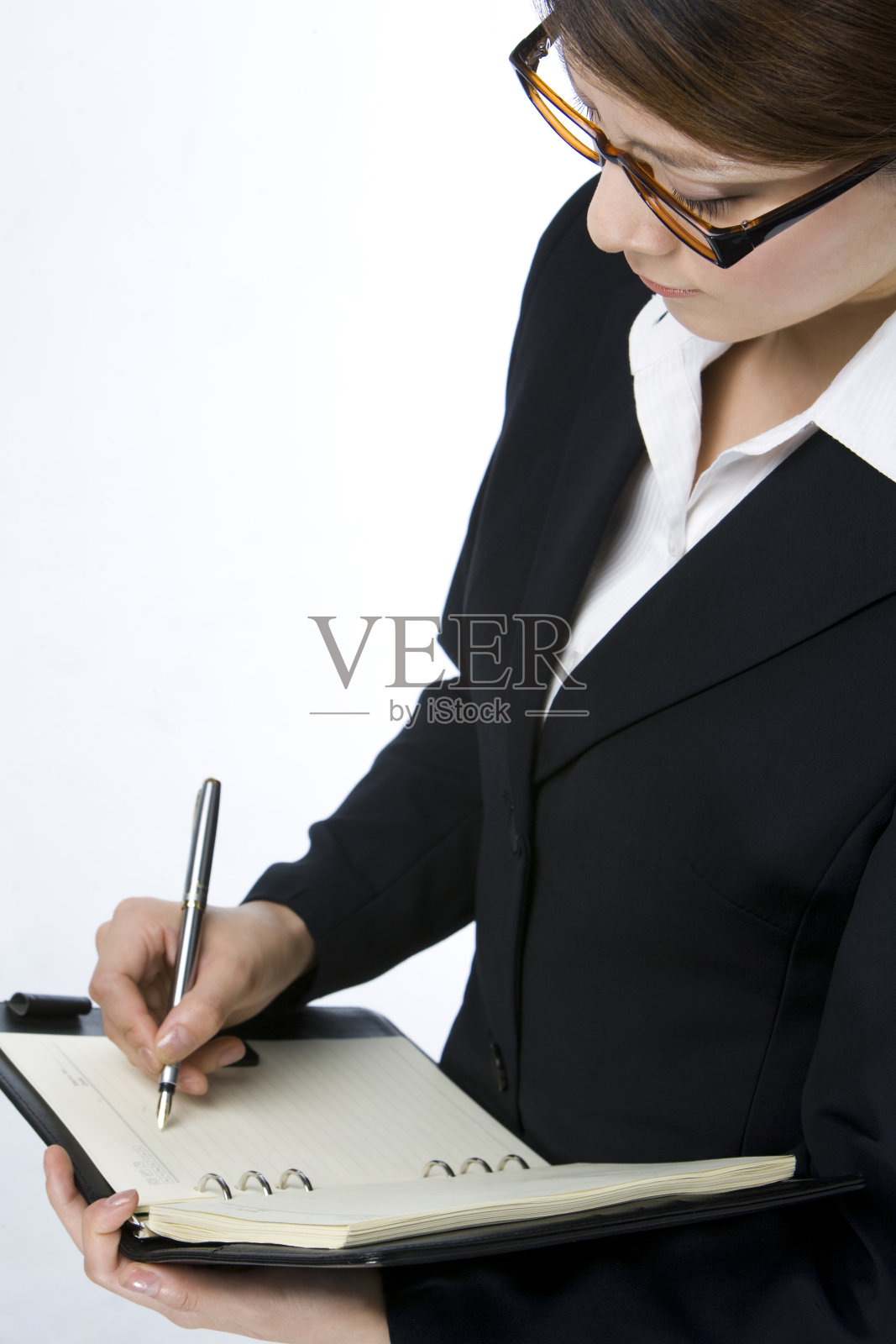 写文件的商务女士照片摄影图片