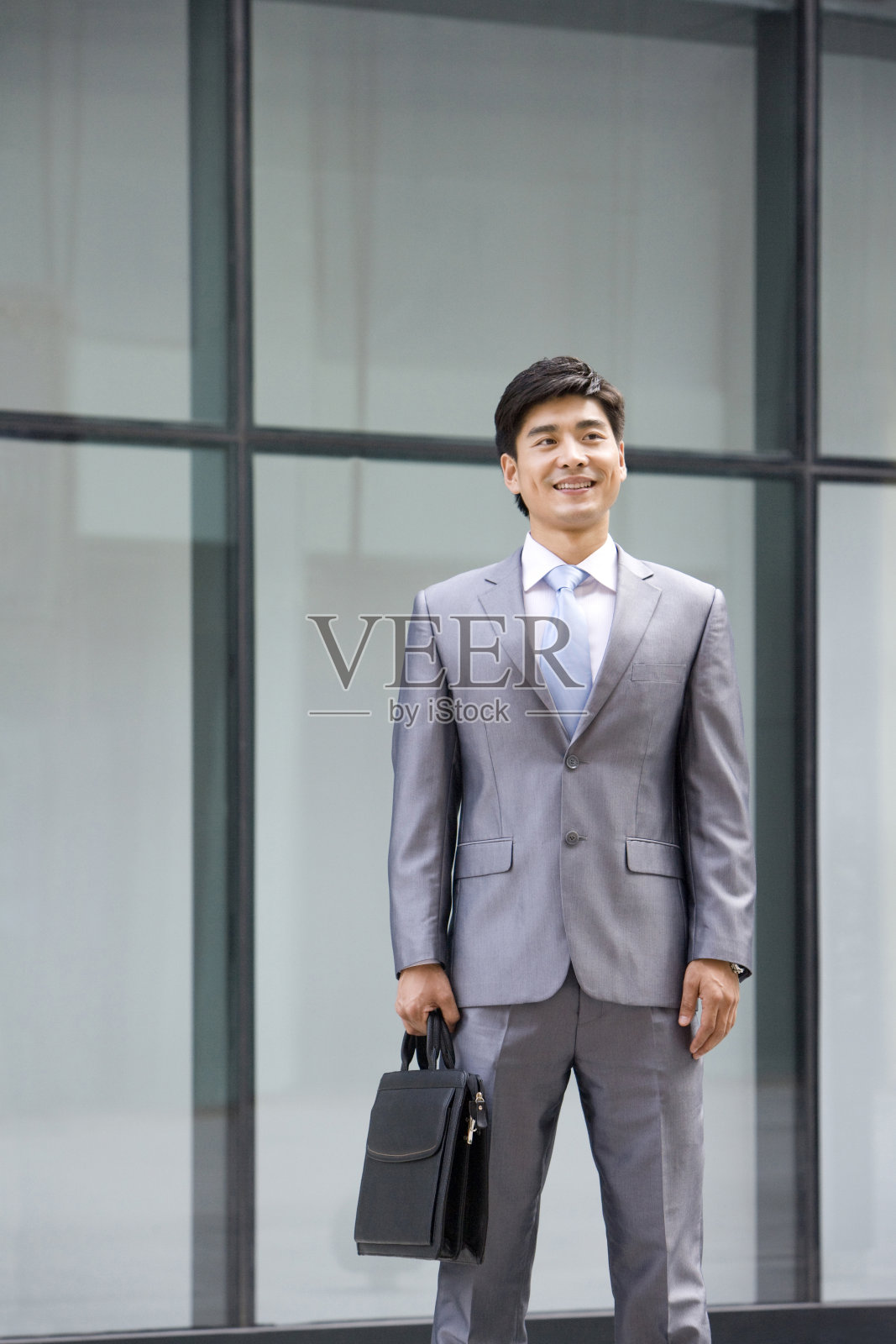 商务男士手提皮包照片摄影图片