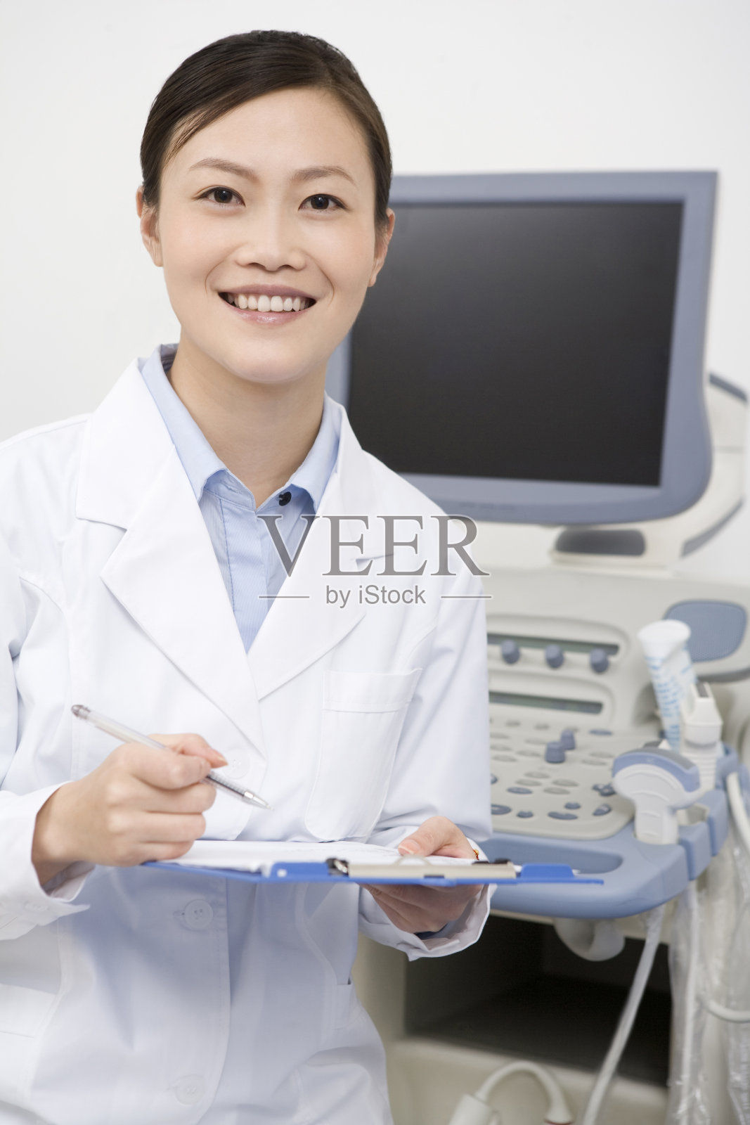 医生做记录照片摄影图片