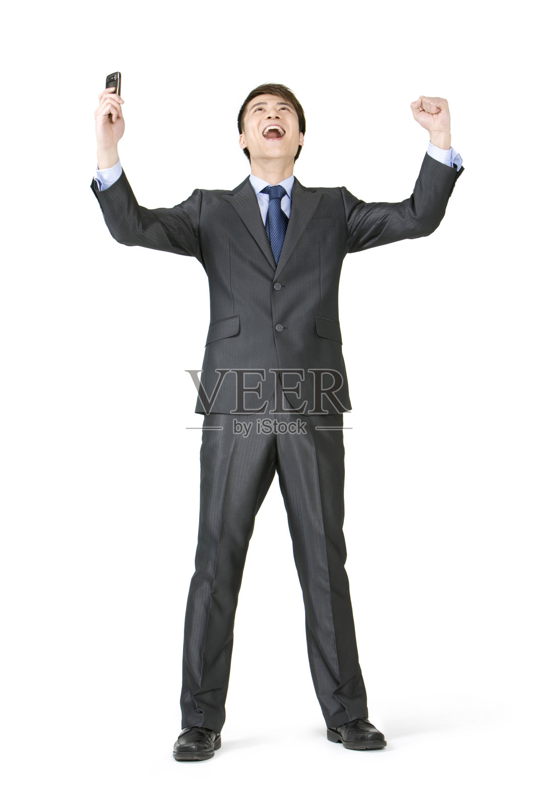 商务男士用手机照片摄影图片