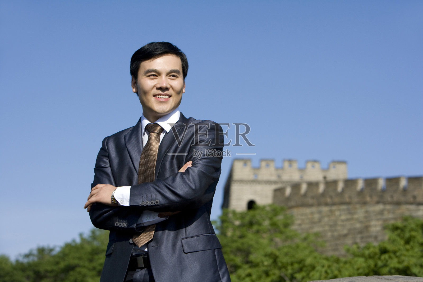 商务男士在长城照片摄影图片