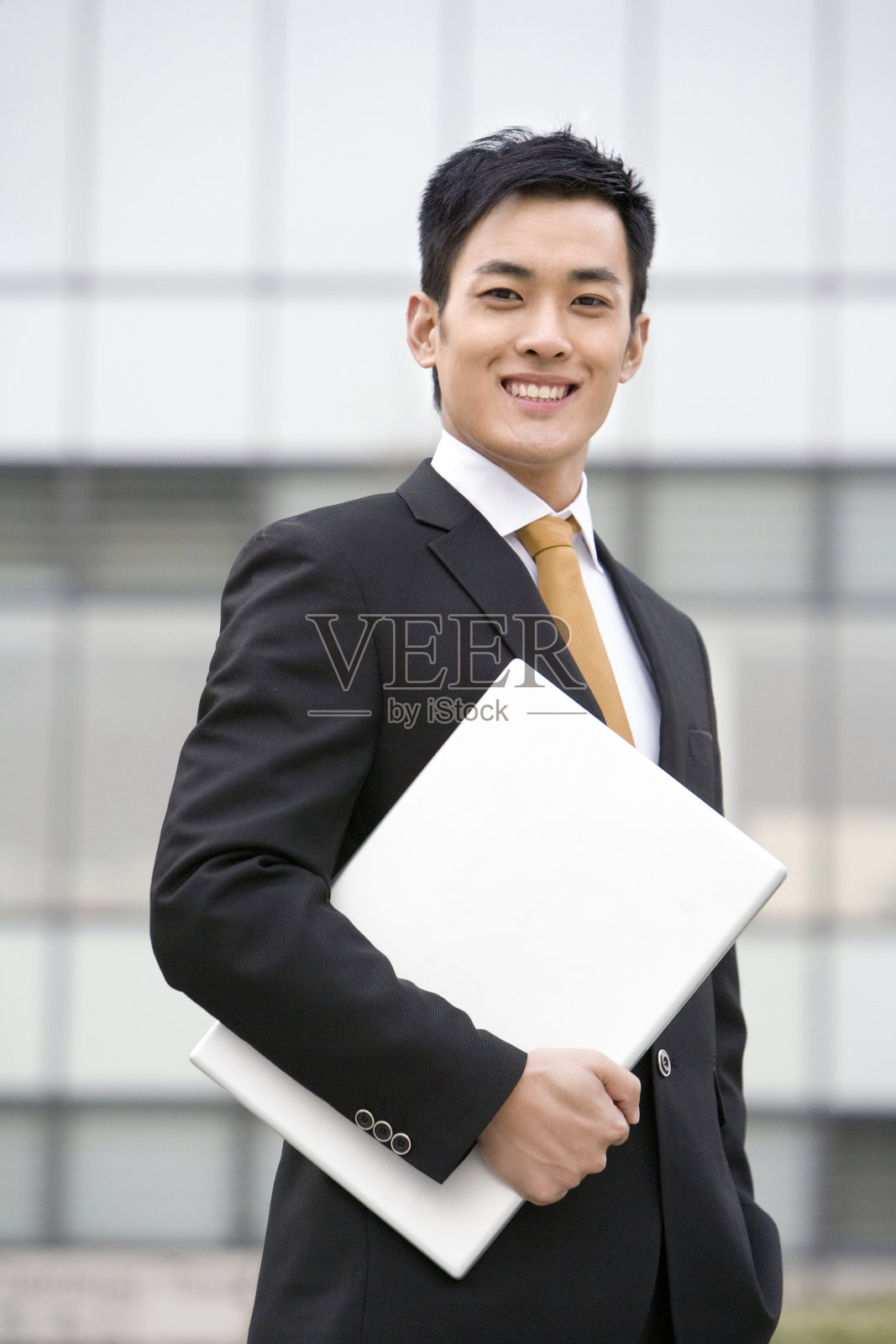 商务男士和笔记本电脑照片摄影图片