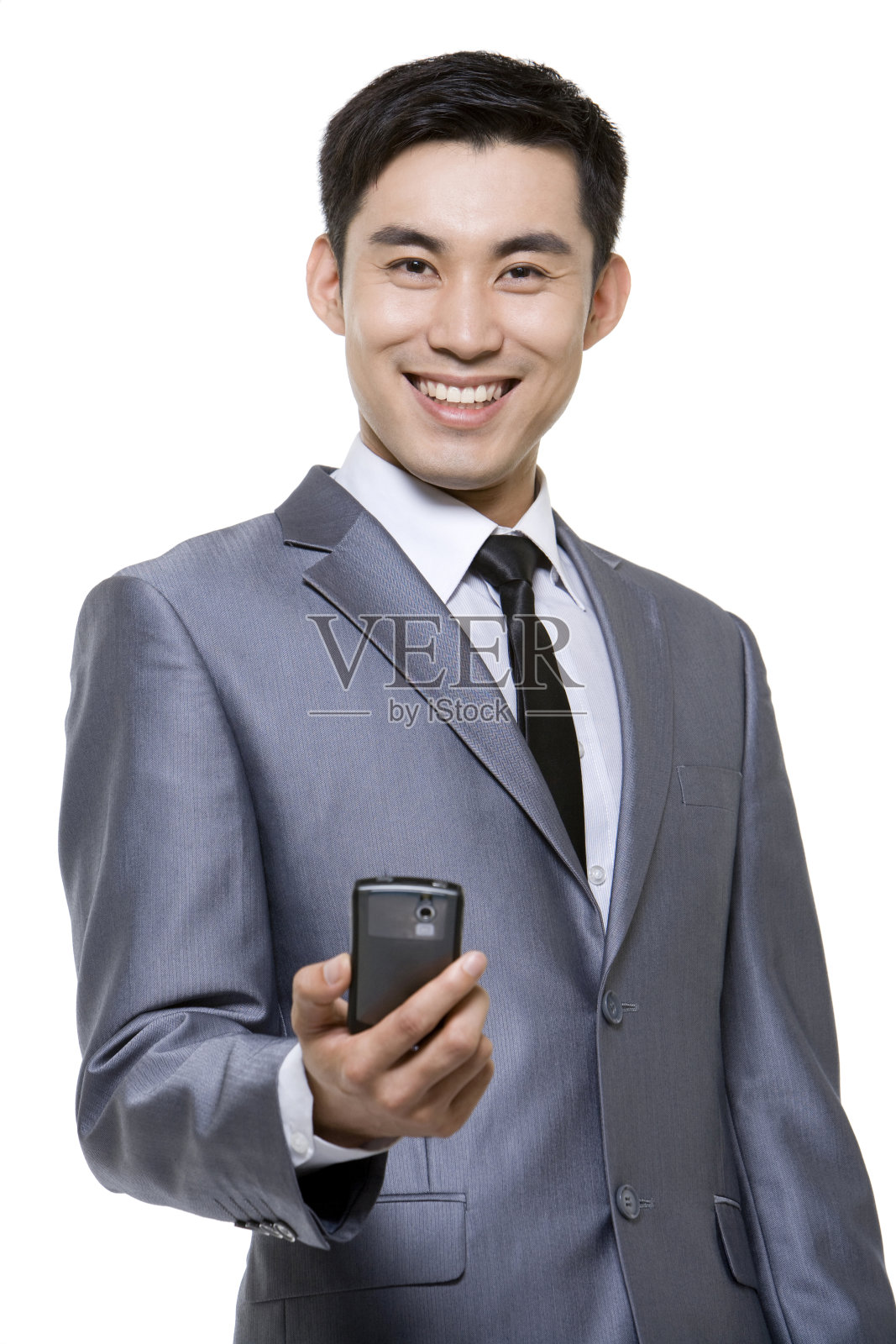 商务男士和手机照片摄影图片