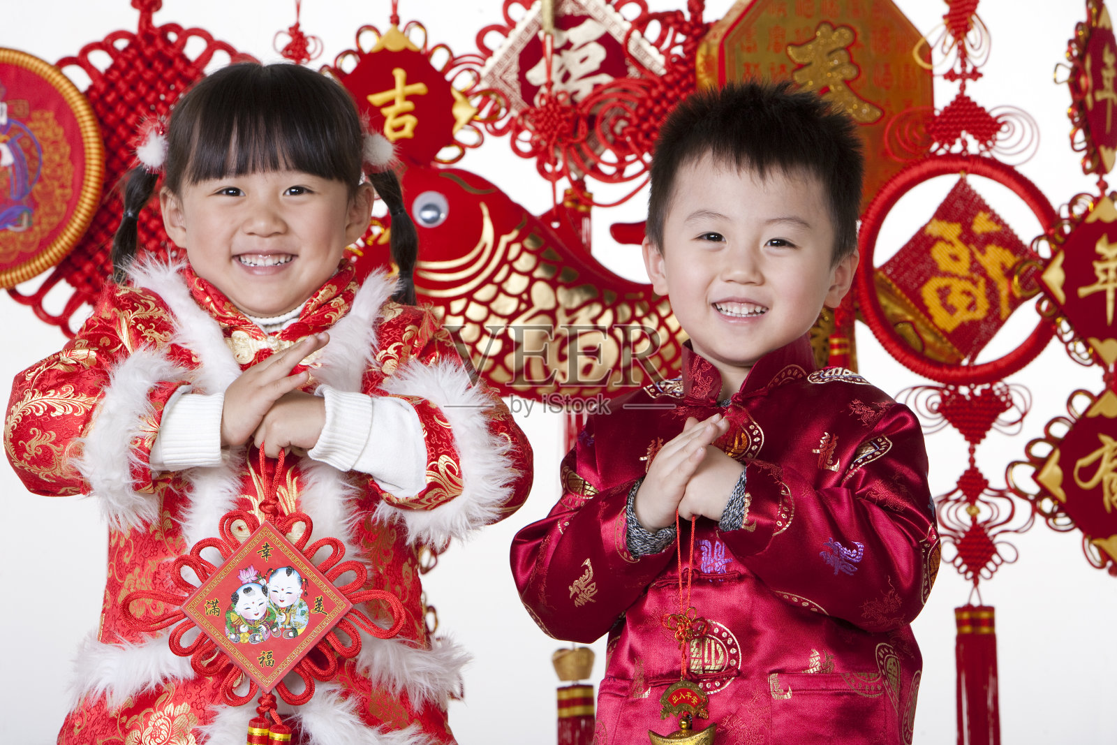 儿童拜年照片摄影图片