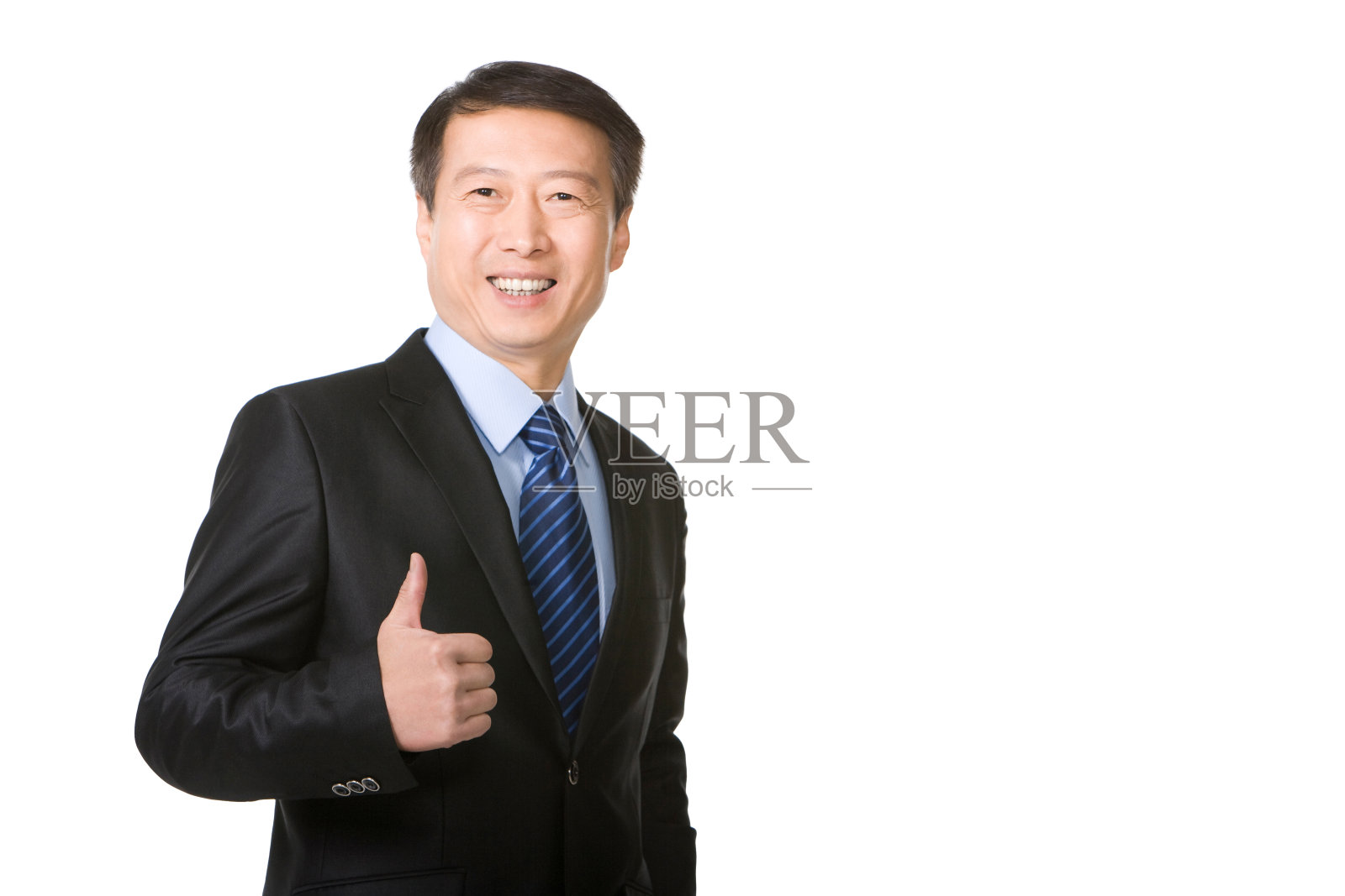 中年商务男士竖起大拇指照片摄影图片