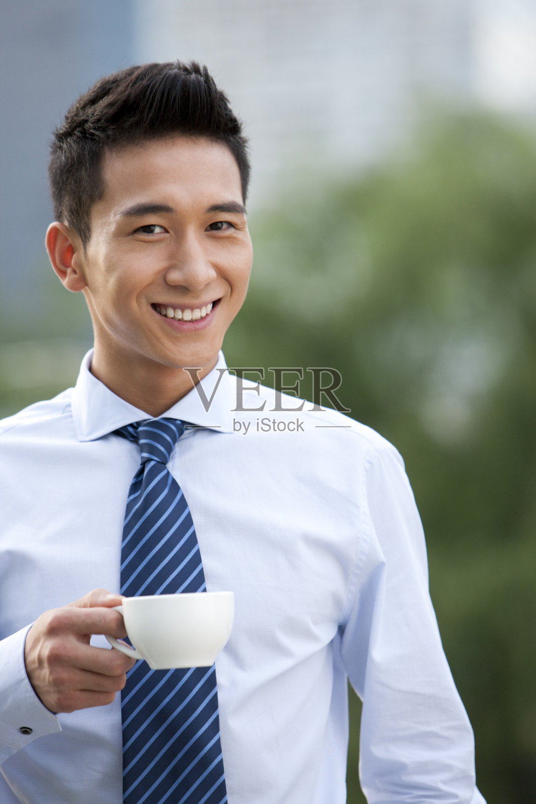 商务人士喝咖啡照片摄影图片